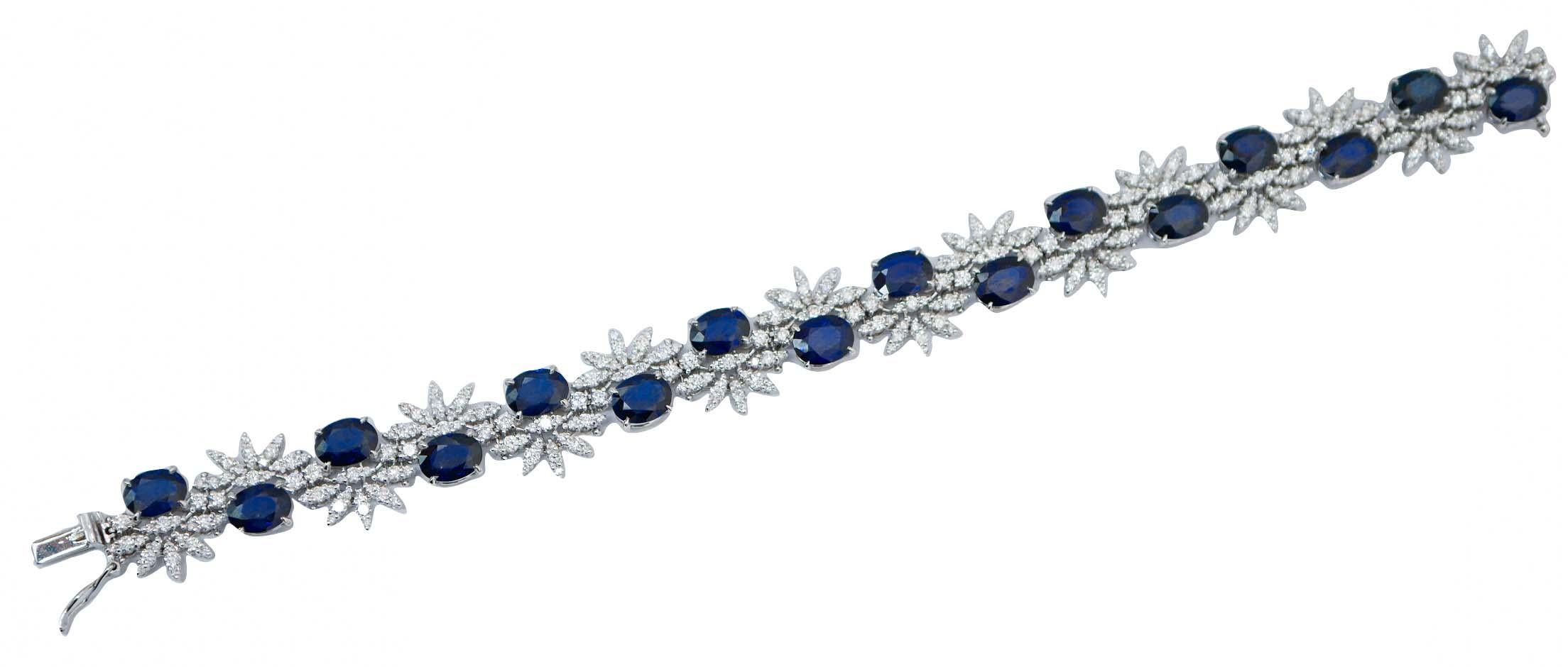 Elegant bracelet in 14 kt white gold structure mounted with sapphires and leaves studded with diamonds.
This bracelet was totally handmade by Italian master goldsmiths and it is in perfect conditions.
Diamonds 7.62 ct
Sapphires 22.83 ct
Total Weight