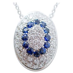 Halskette mit Anhänger aus 18 Karat Weißgold mit Saphiren und Diamanten.