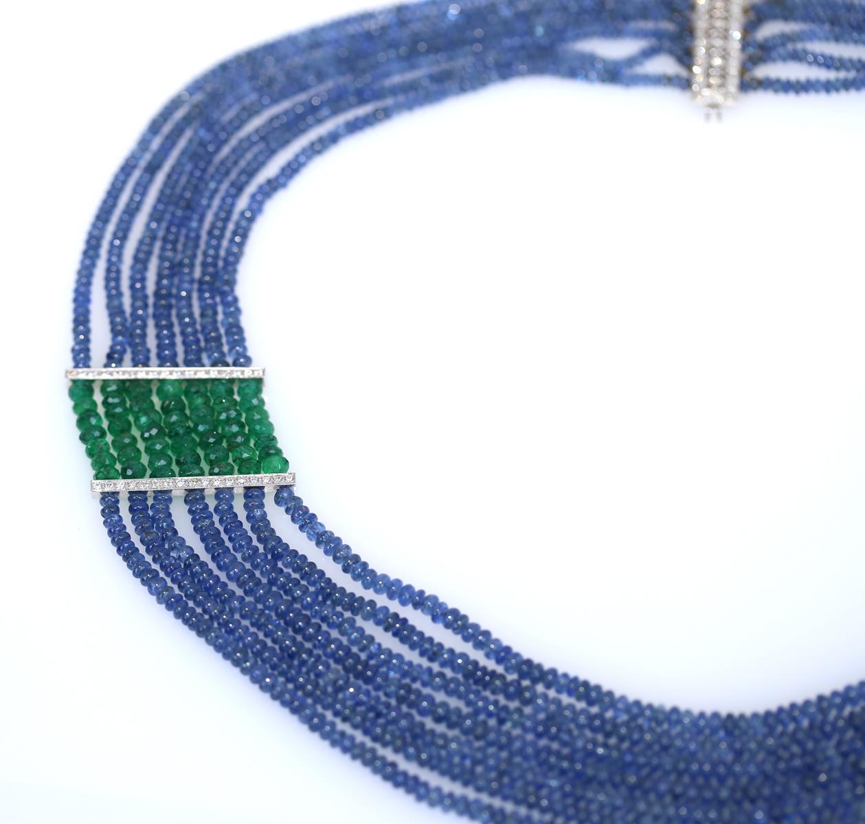 Sapphires' Diamonds Emeralds Necklace was created in the 1970es. 
Sapphire Diamonds Emerald Necklace. A multi-strand sapphire and emerald necklace. Comprising of 300 Carats of Sapphires beads and Green faceted Emeralds. A superb necklace that sits