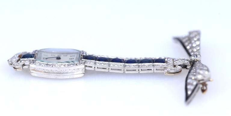 Sapphires Diamonds Onyx Platinum Swiss Brooch Watch Published, 1920 For Sale 2