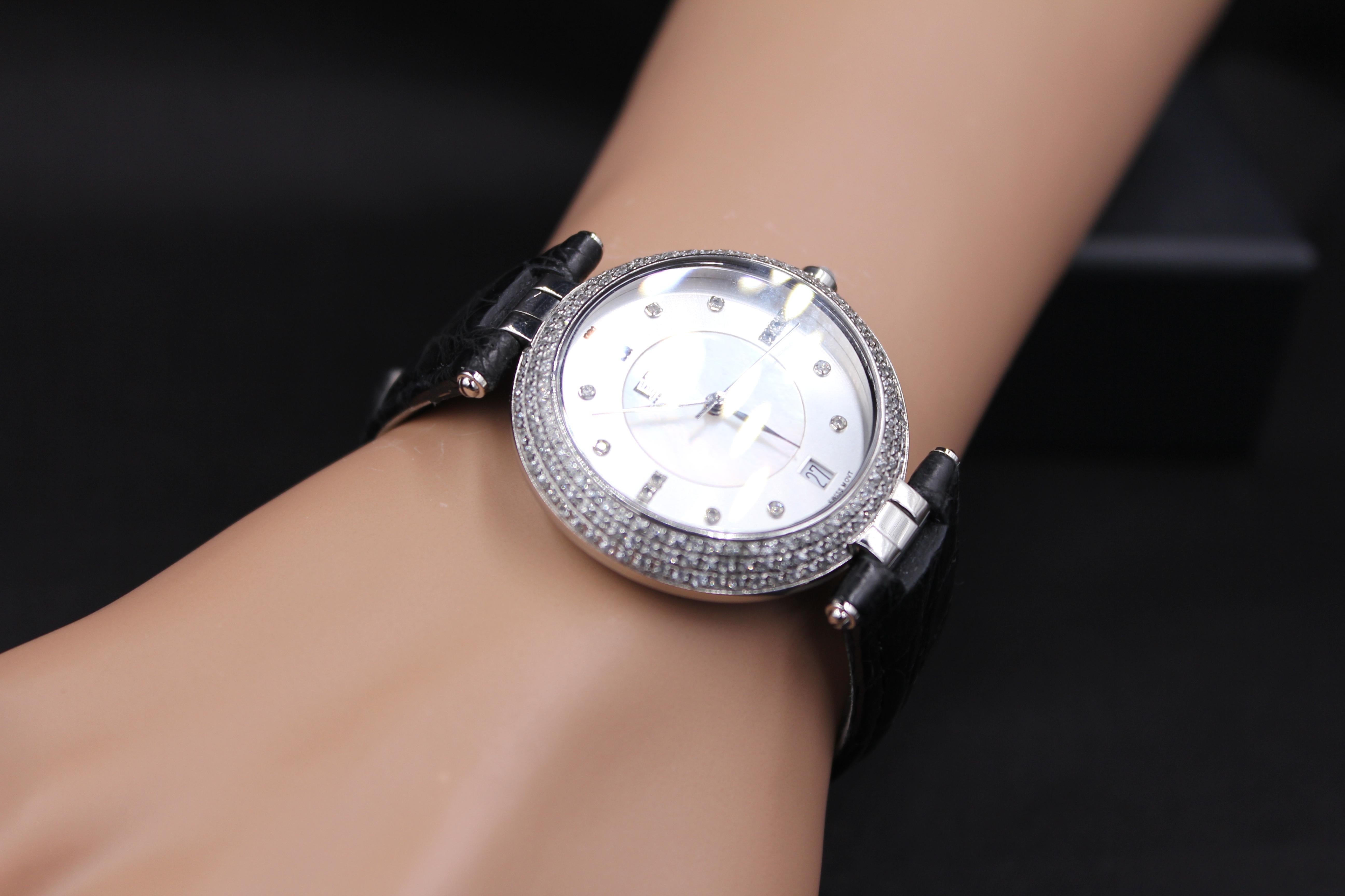 · ·         Quality Swiss-Quartz movement guarantees precision timing
·         Mother-of-Pearl dial micro-paved with diamonds and gemstones enhances any dress style
·         Scratch-resistant sapphire glass lens
·         Genuine exotic crocodile