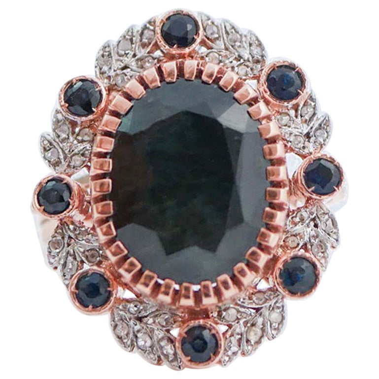Anello con zaffiri, diamanti, oro rosa e argento.
