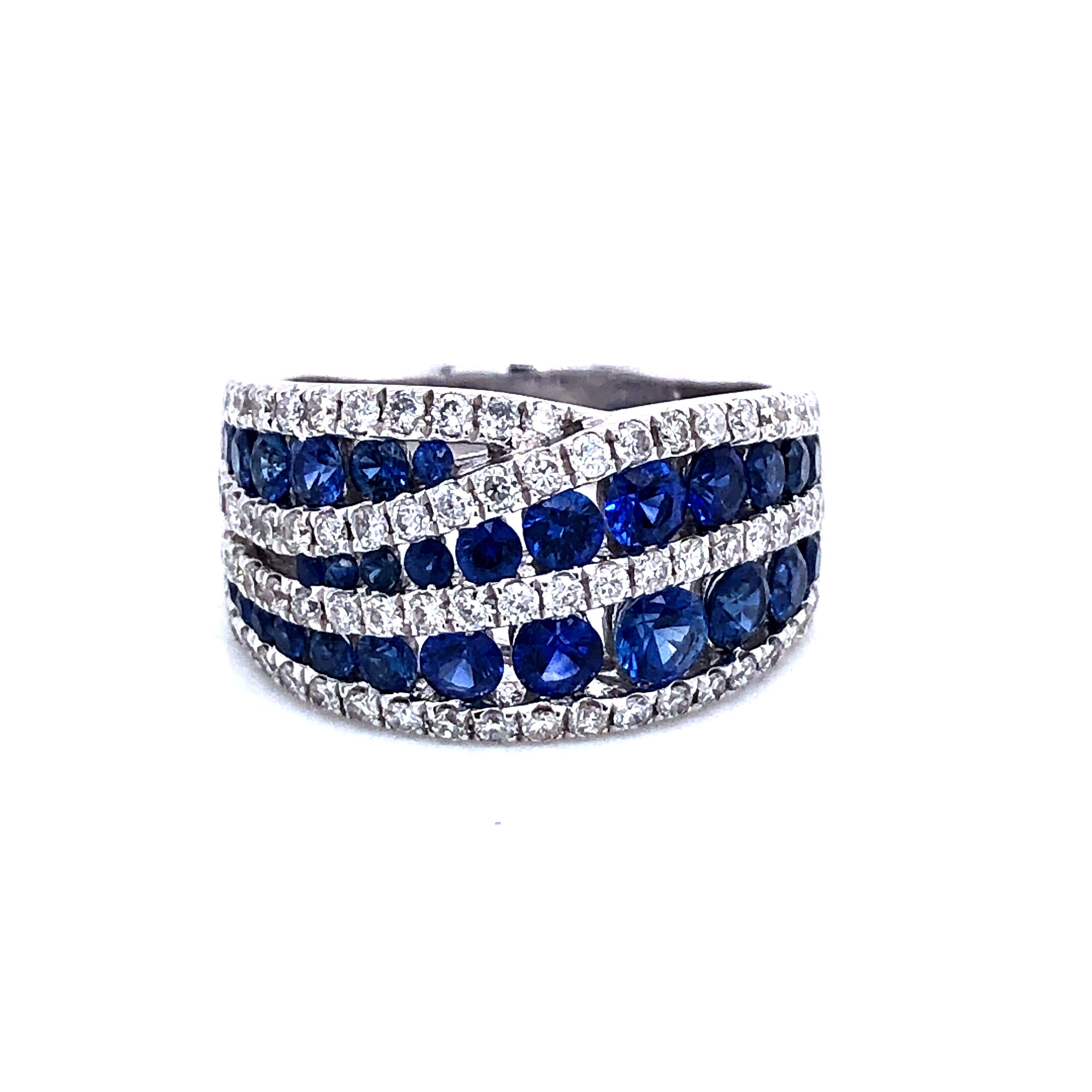 White Gold 18 Carat Sapphires and Diamonds Cocktail Ring.
Sapphires 1,850 Carat
Diamonds 1,000 Carat Color G/H 
French Size 54
US Size 6 3/4
British size M