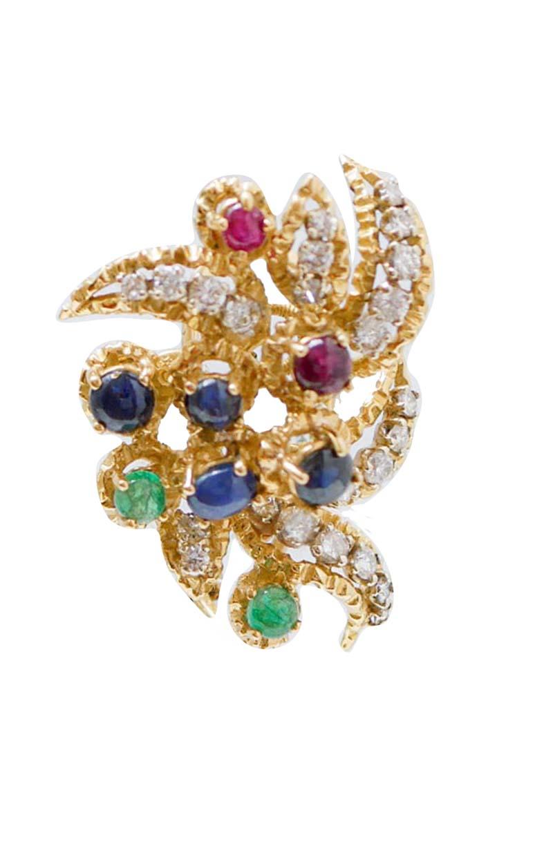 Elegant earrings in 18 kt yellow gold structure mounted with diamonds and, between of them, emeralds, rubies and sapphires.
These earrings were totally handmade by Italian master goldsmiths and they are in perfect conditions.
Diamonds 1.26