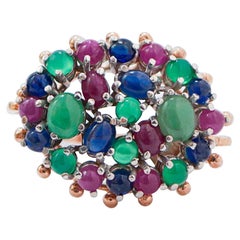 Zaffiri, smeraldi, rubini, anello in oro rosa e argento.