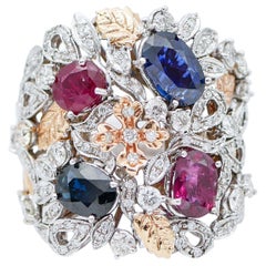 Bague en or blanc et rose 14 carats, saphirs, rubis, diamants