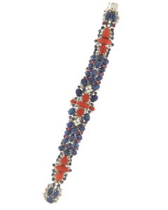 Bracelet manchette en or blanc 18 carats avec saphirs, rubis et diamants