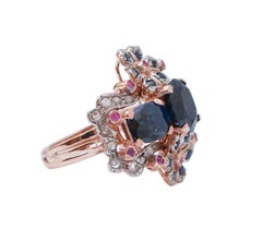 Sapphires, Rubies, Diamonds, Rose Gold and Silver Ring.