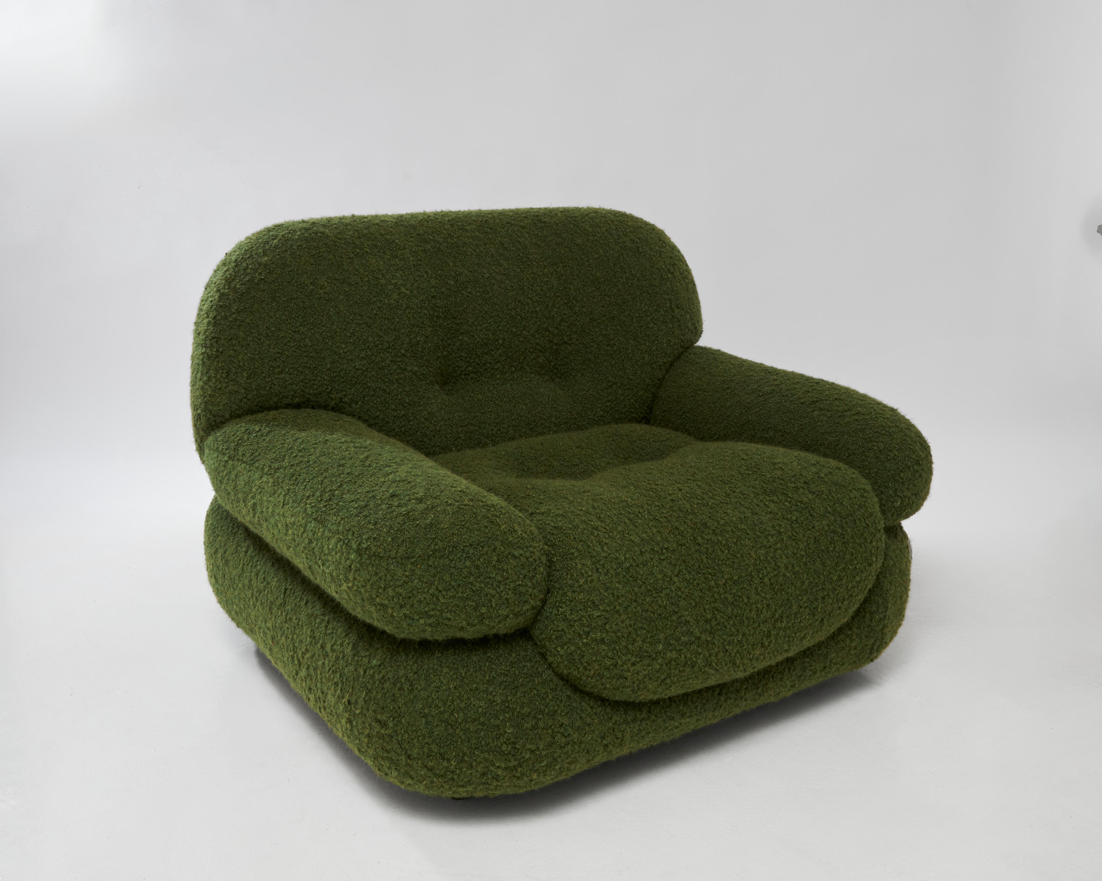 A spacious and comfortable armchair designed by Sapporo for Mobil Girgi in Italy during the 1970s. This large and stylish chair boasts fluffy cushions and inviting round shapes that beckon you to sit back and unwind. Designed with comfort in mind,