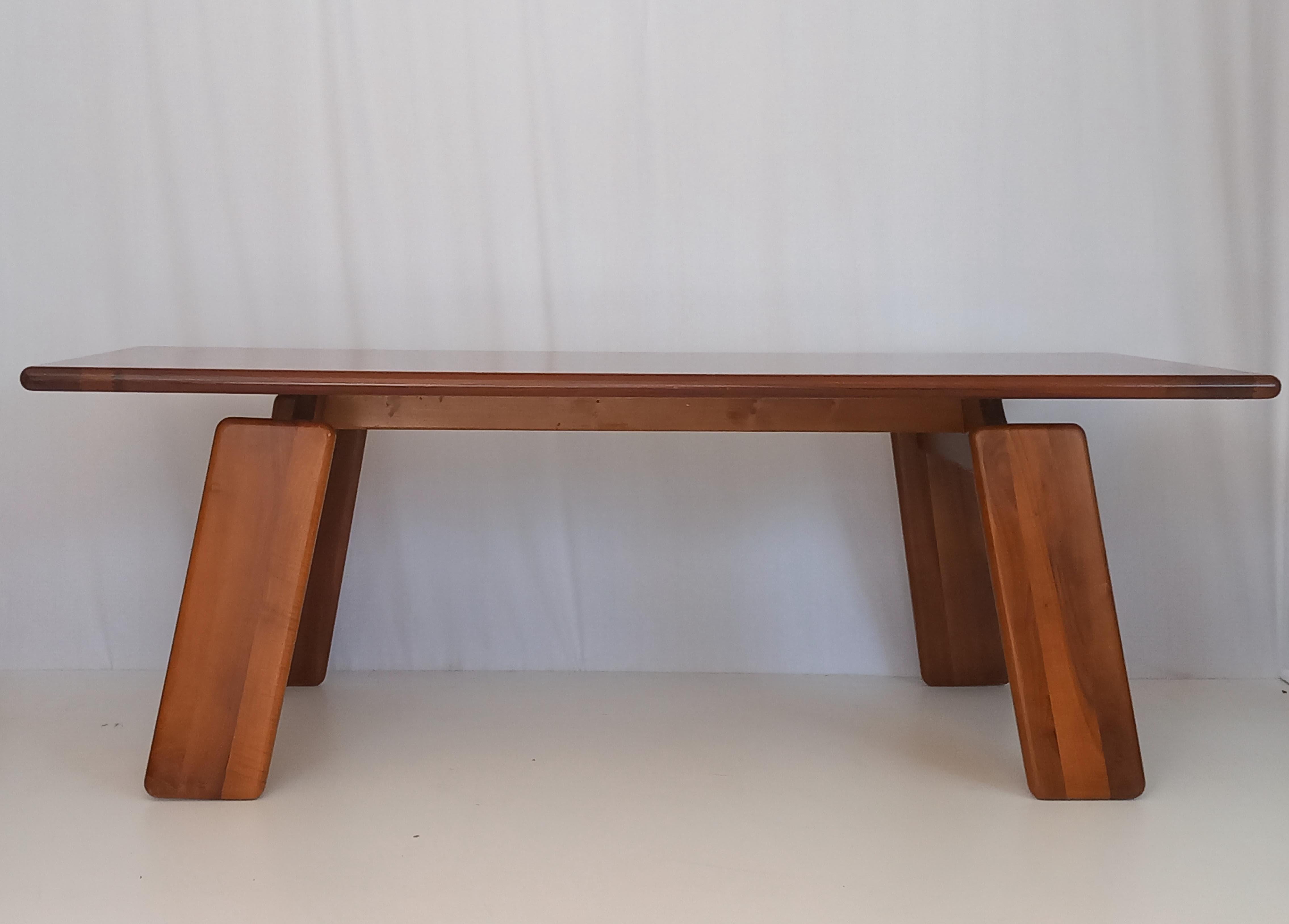 This stunning walnut table, model Sapporo, was designed by the legendary Italian architect and designer Mario Marenco, and produced in the 1970s by the renowned Italian furniture firm Mobil Girgi.
With a sturdy structure and refined, elegant design,