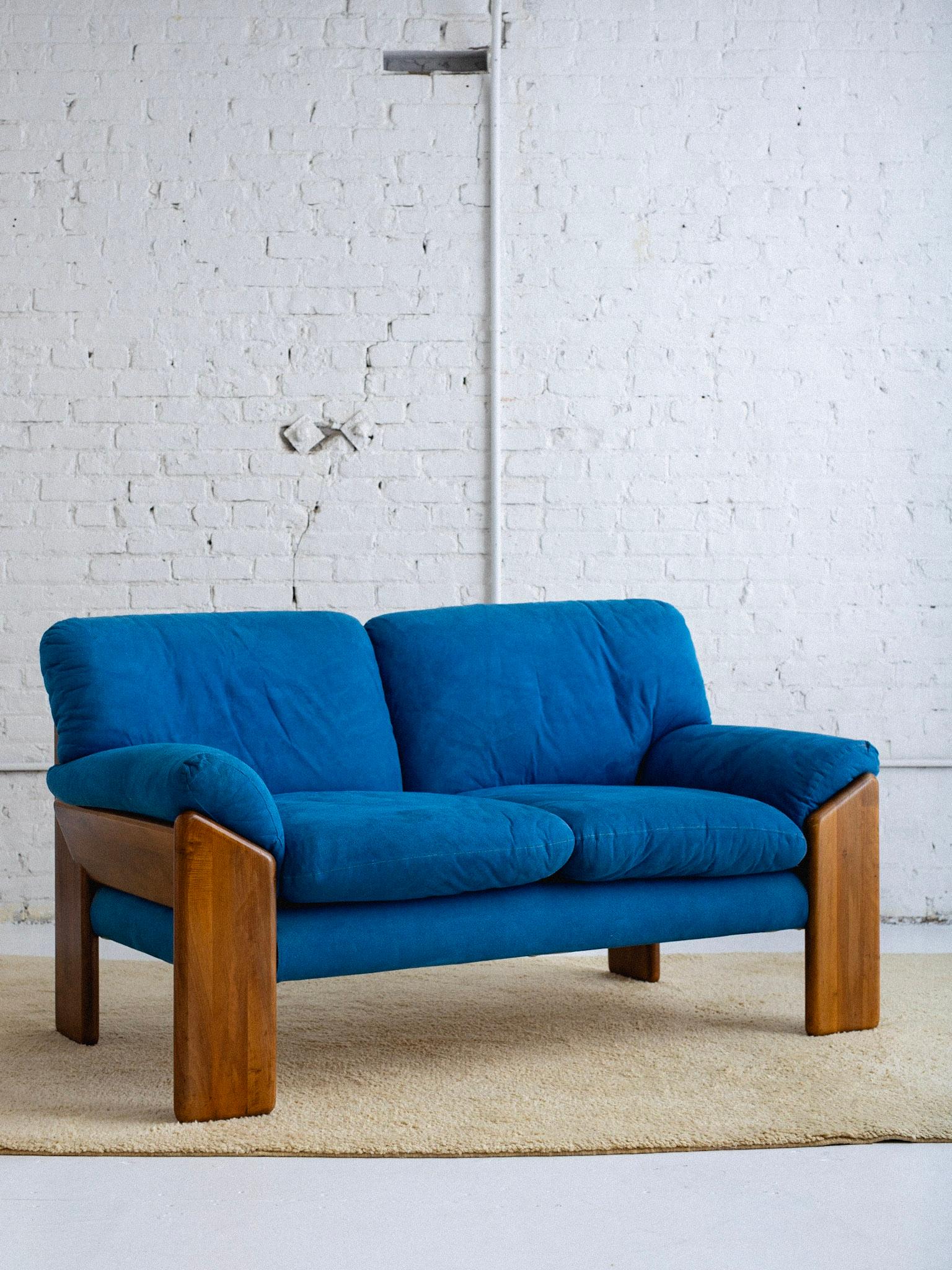 A 'Sapporo' two seat sofa designed by Mario Marenco for Mobil Girgi. A solid wood frame holds six removable cushions. Cobalt blue ultra suede upholstery. Reupholstery recommended. Stamped “Mobil Girgi.” Sourced in Northern Italy. Three seat sofa and