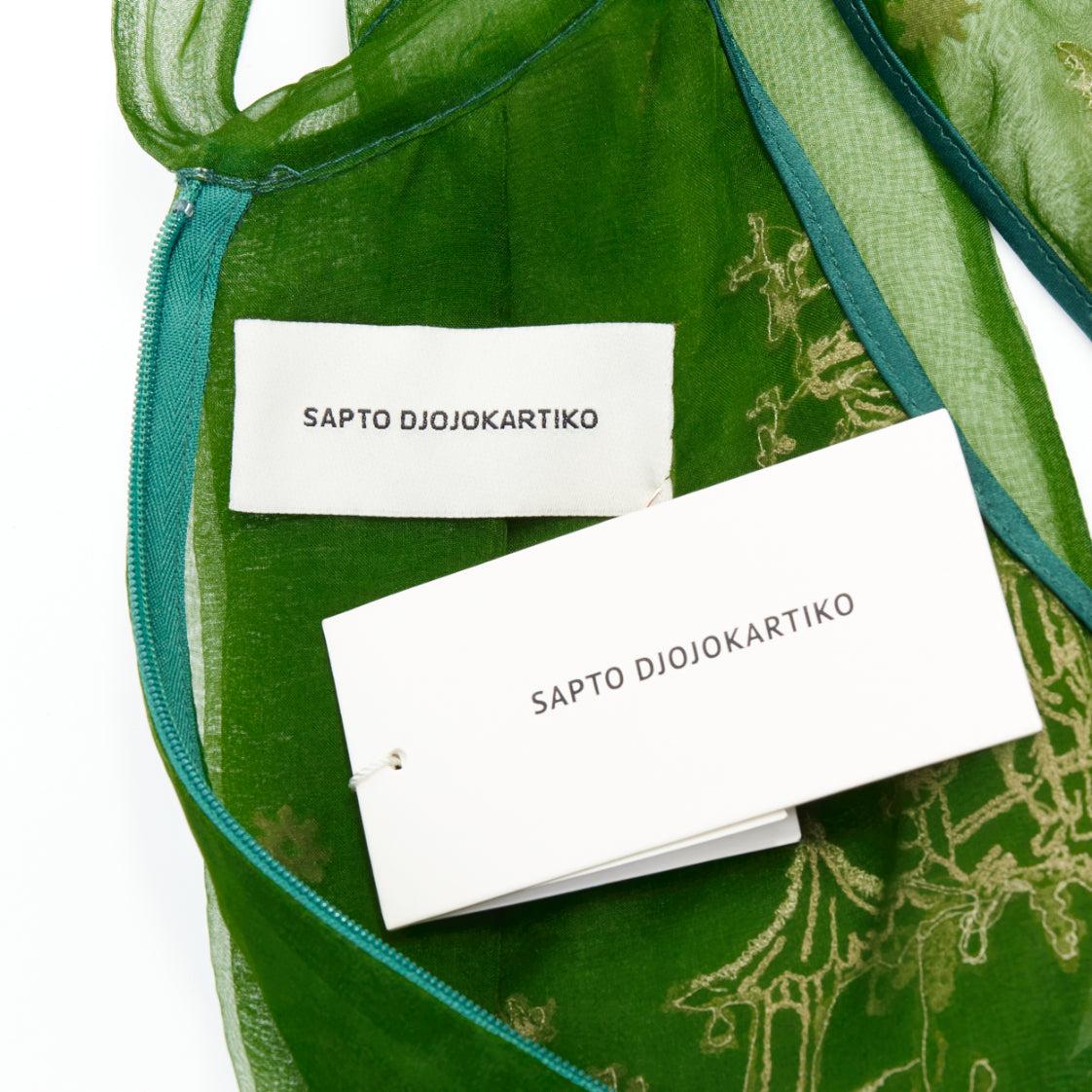 SAPTO DJOJOKARTIKO top sin mangas bordado oriental verde beige en venta 3
