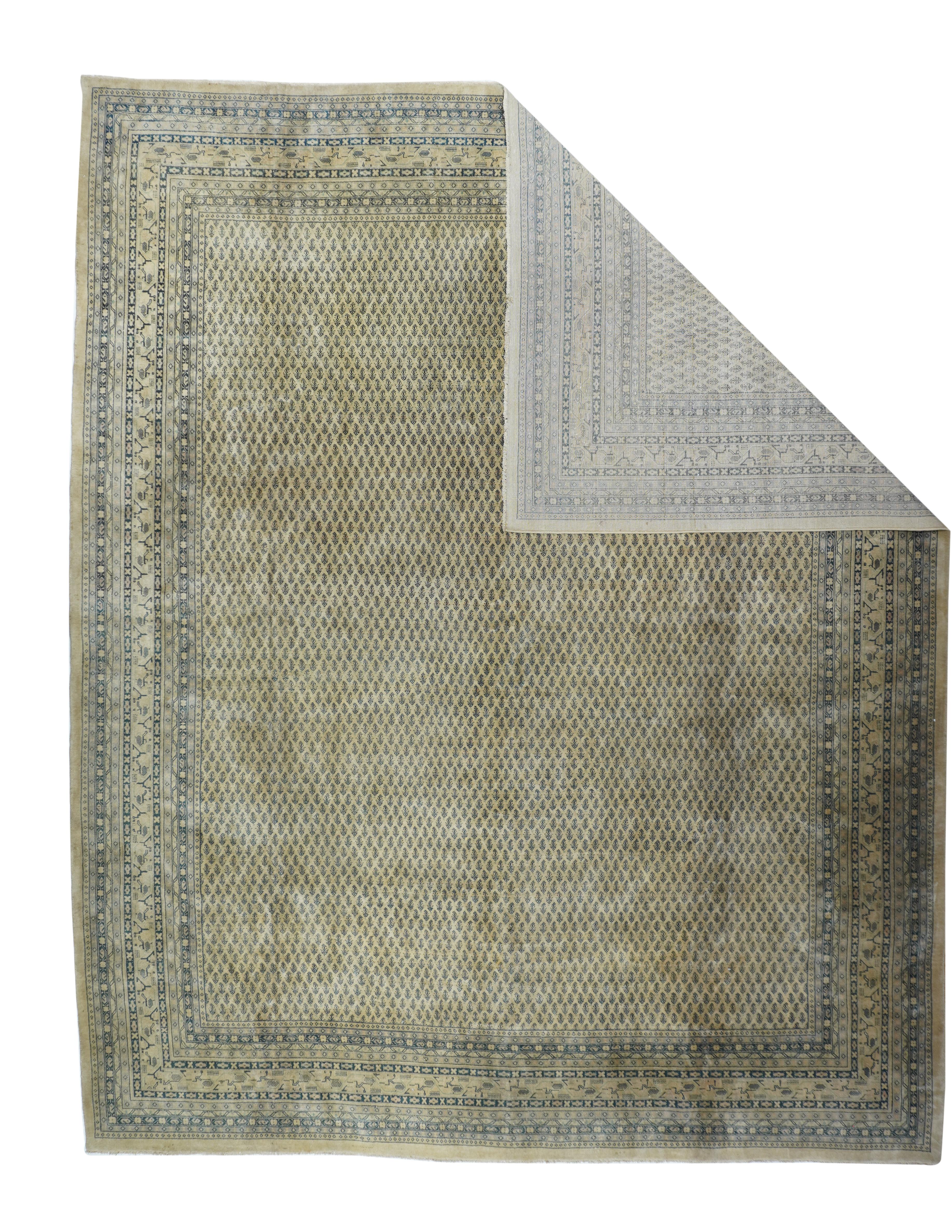 The straw-sand field shows literally thousands of tiny offset-row reversed botehs, Twelve patterned minor borders and a straw-sand main stripe with a epeating 