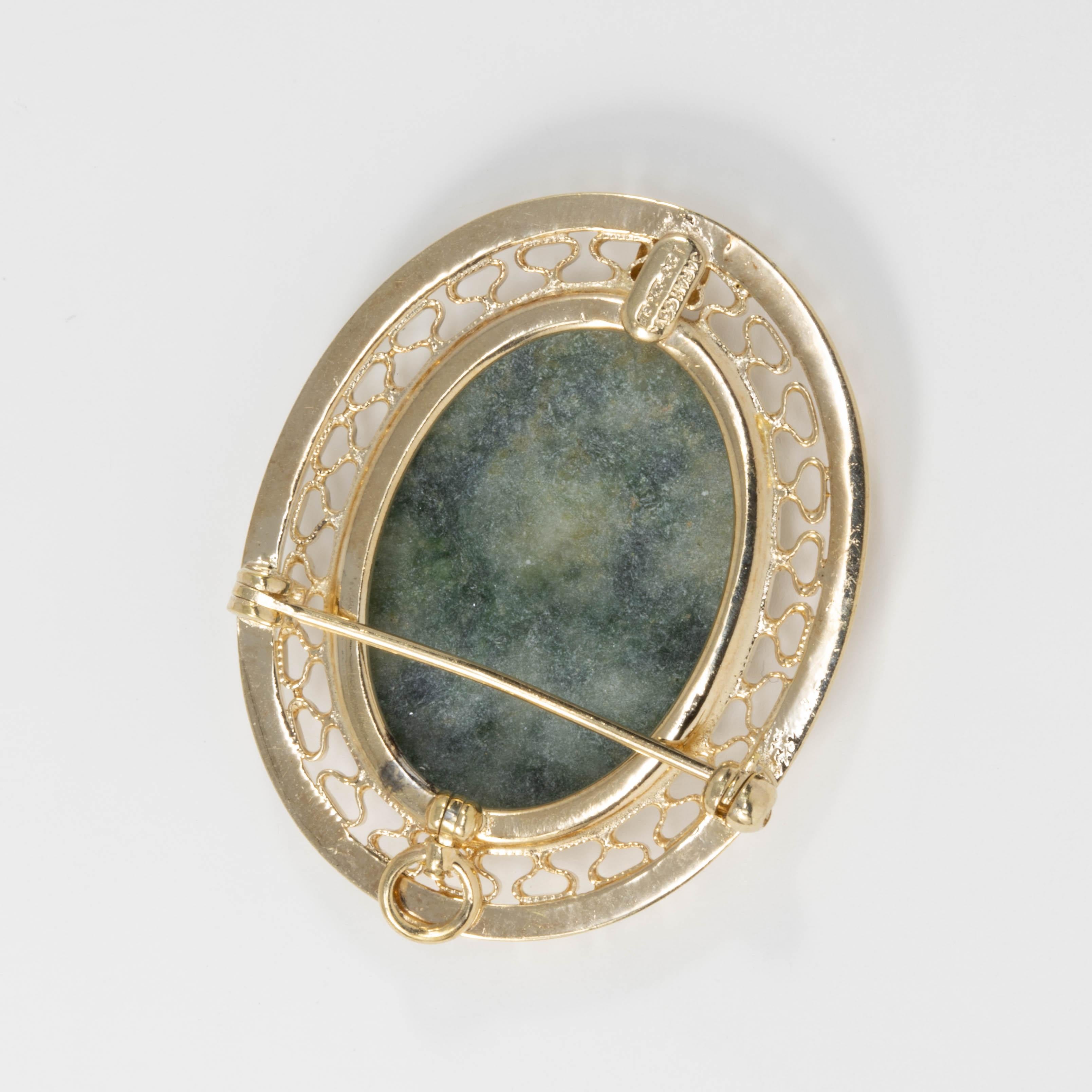 green brooch