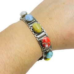 Bracciale firmato da Sarah Coventry con cabochons in vetro color argento