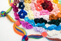 "How Does My Hair Look?" Assembled hair scrunchies, vibrant, synthetic fibers