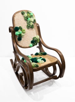 "Outgrown" Vintage found object, woven yarn, moss motif, chair sculpture
