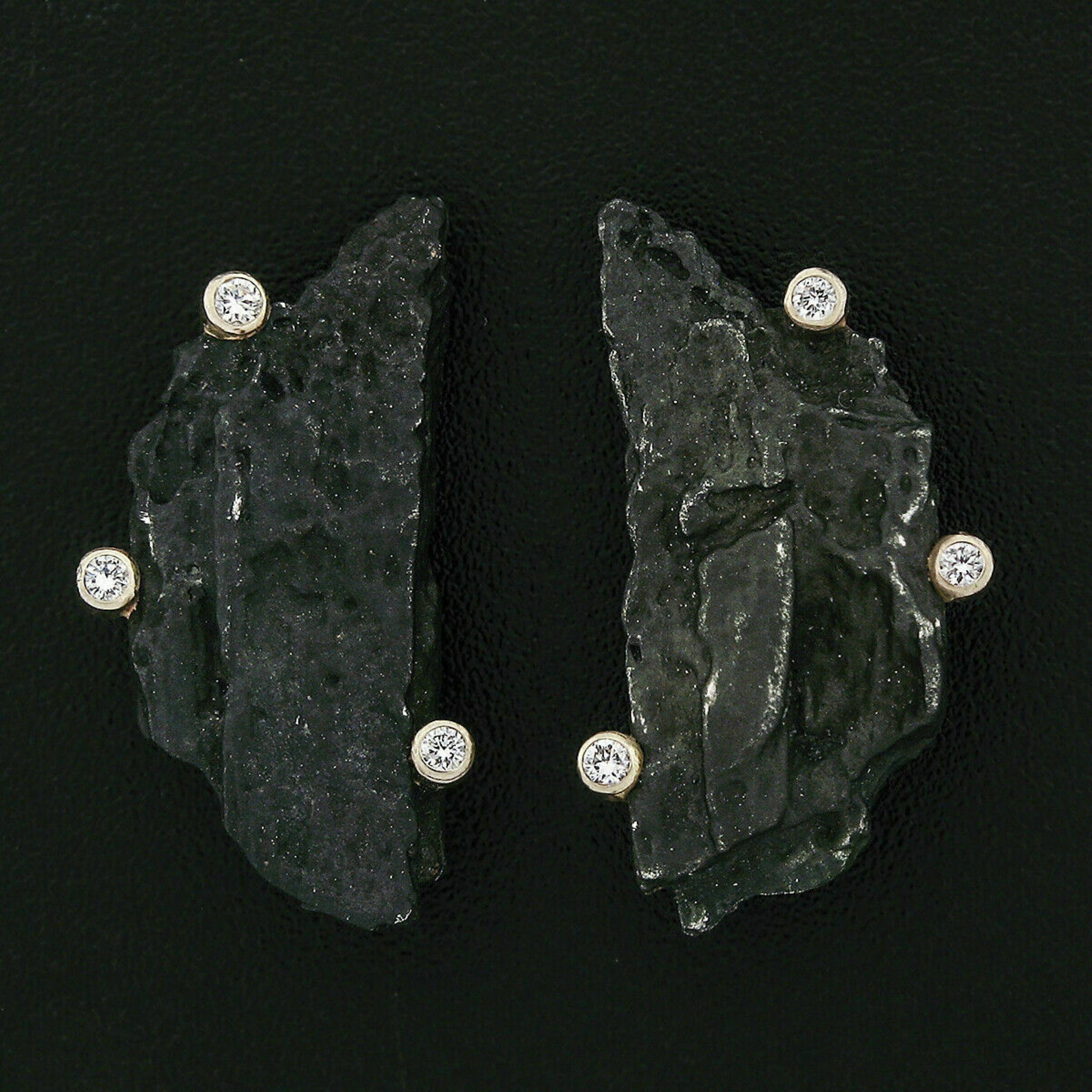 Here we have a gorgeous pair of designer earrings crafted from oxidized cobalt-chrome and solid 18k white gold by Sarah Graham. These earrings are from Graham's 