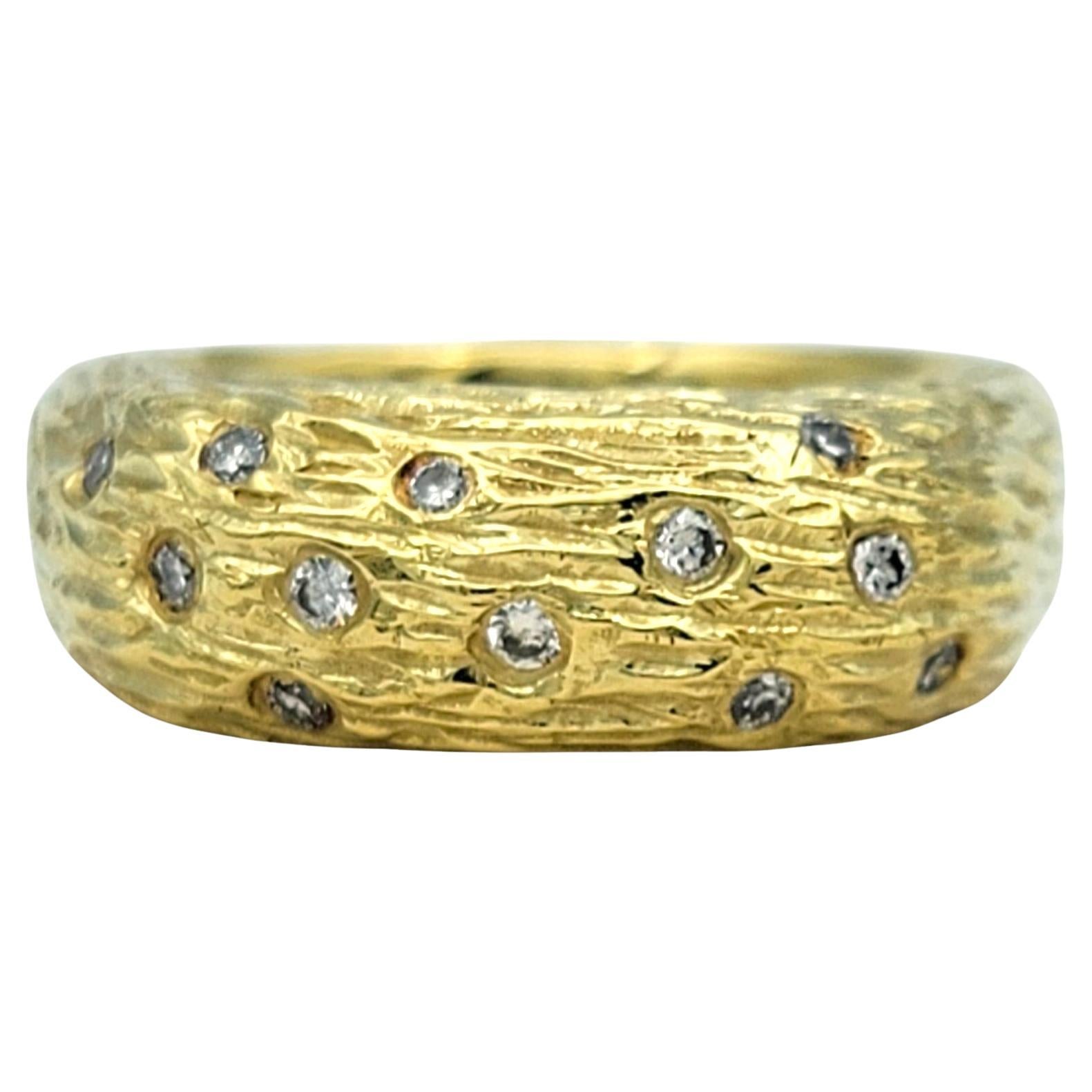 Ring Size: 6.5

Celebrate artisanal craftsmanship with this authentic textured ring by designer Sarah Graham. Crafted in rich 18 karat yellow gold, the band features a bold, organic texture that adds depth and dimension. Scattered across the surface