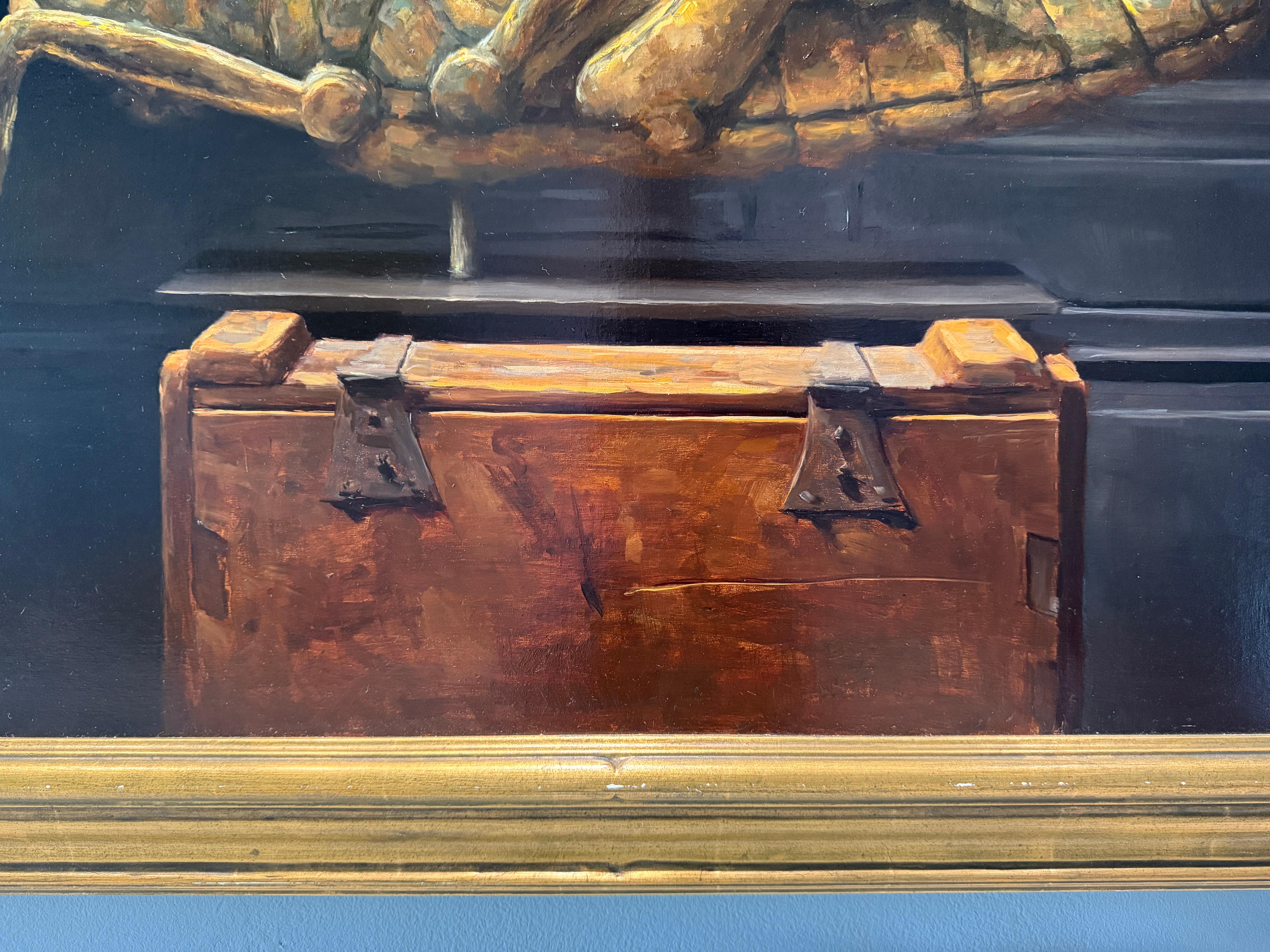 A major oil painting from American Realist painter Sarah Lamb.  A unique, antique weathervane in the form of a brass grasshopper is the subject of this still life, set atop a rustic wooden trunk, and set against a black lacquered paneled wall.