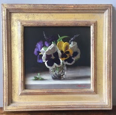 Pansies dans une jaggere en verre