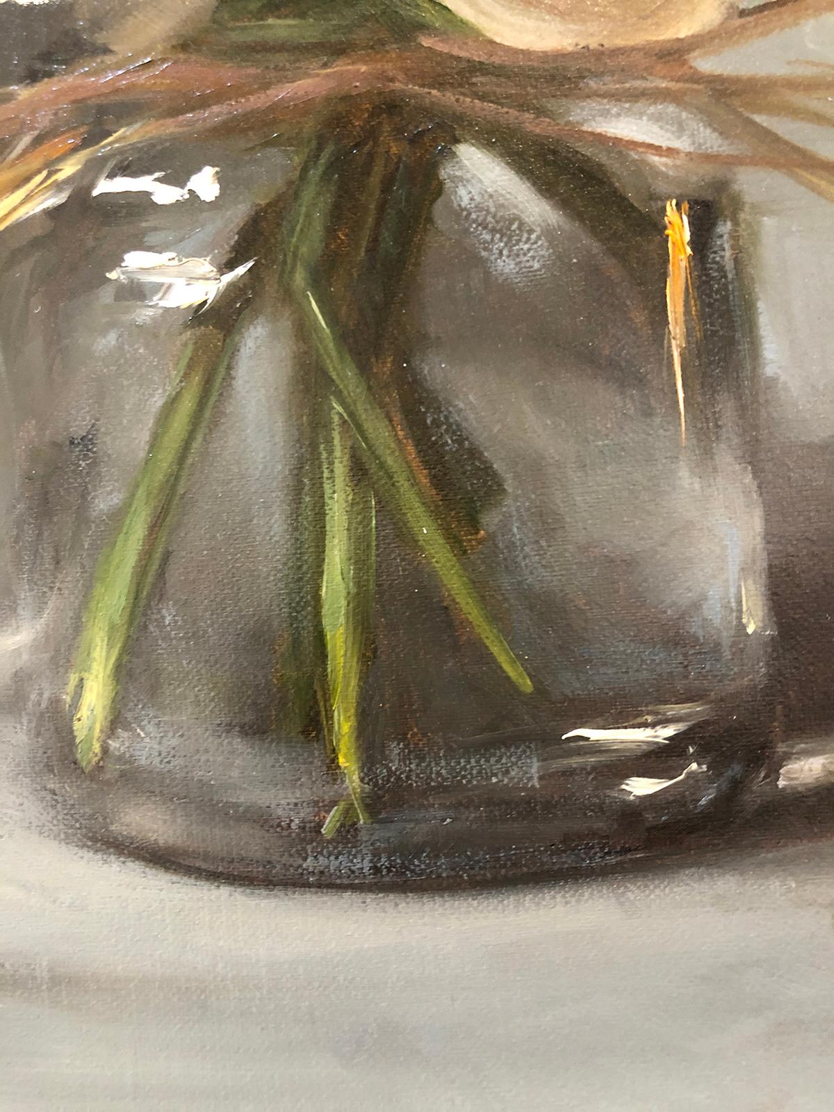 This still life shows a glass vase filled with three ivory/rose colored peonies in full bloom.

Sarah Lamb is a talented and dynamic realist painter. With classical skill—and through transparency, depth and texture—she captures the minute details of