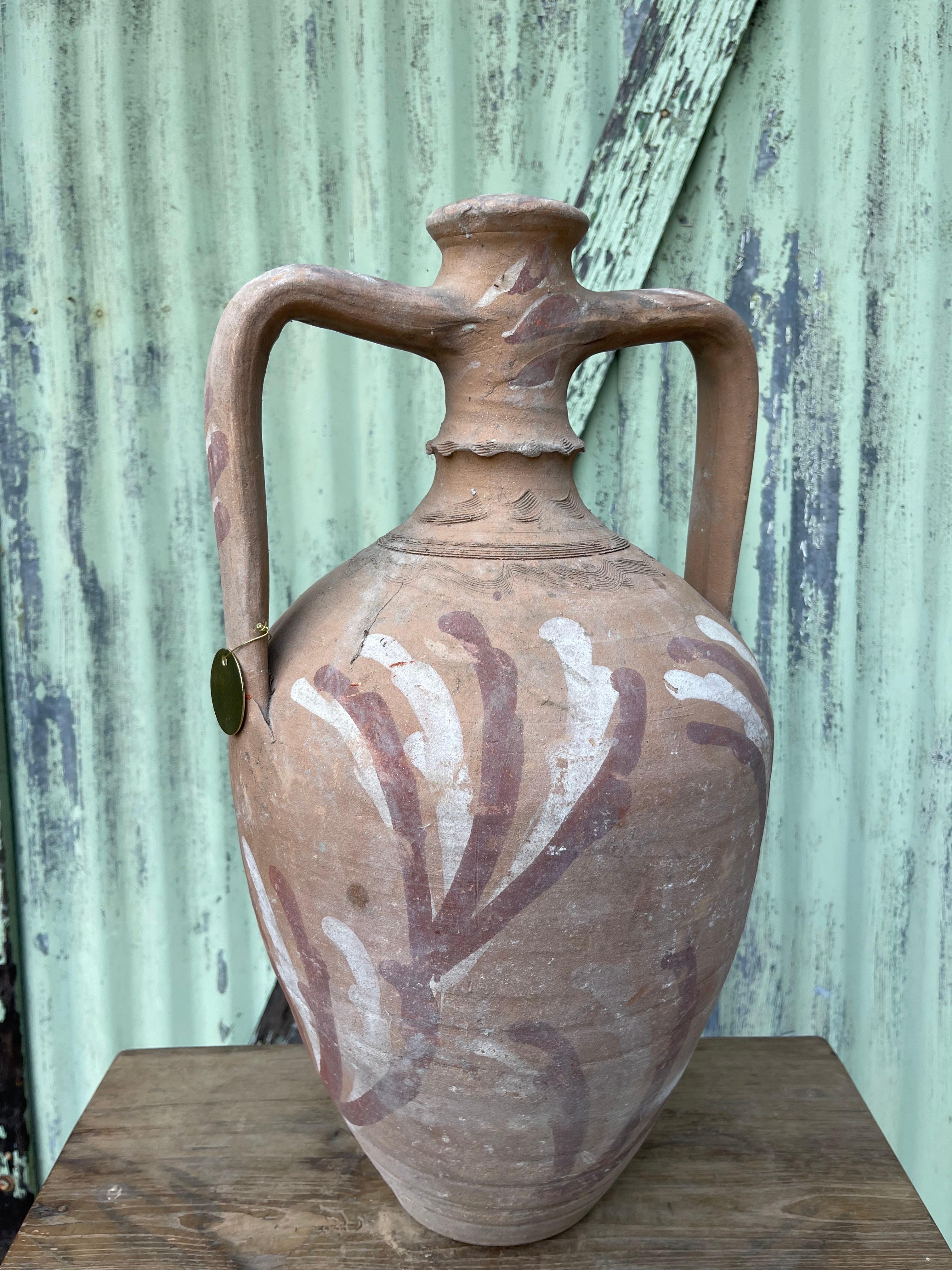 This set of large Turkish jugs was used to store and serve liquids, likely wine, to generations of families in the Levant.  

Wine production in Anatolia can be traced back to the Hittites: ancients who called the region home from 1600-1200 BCE.