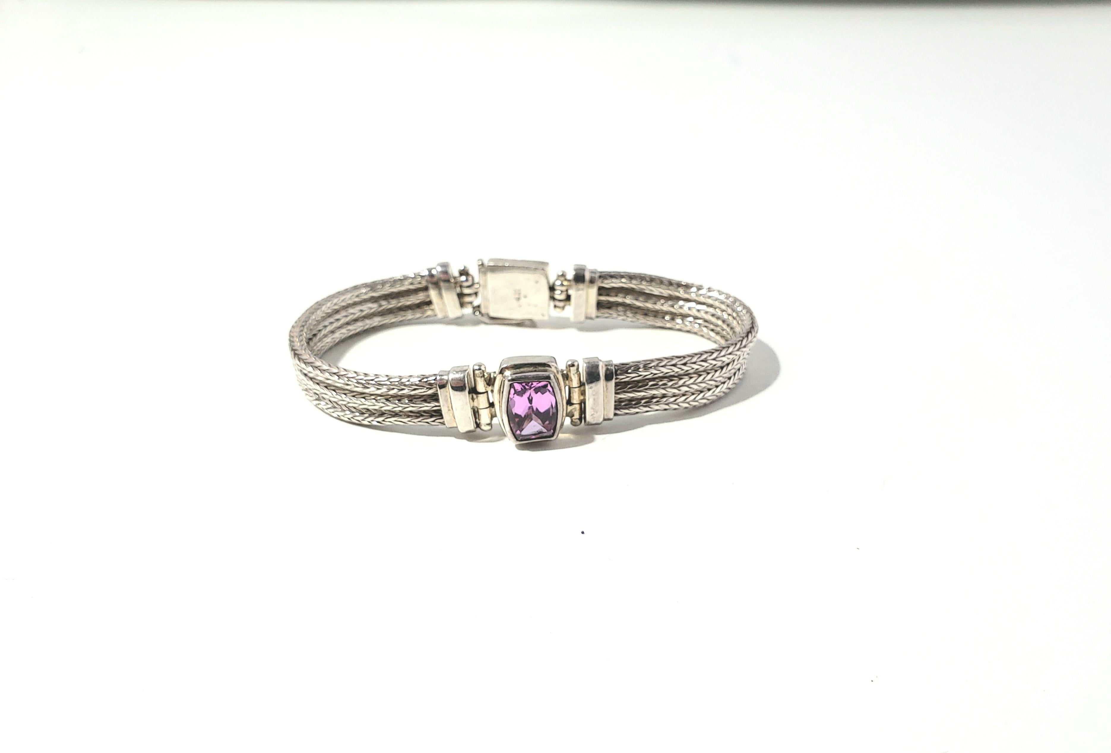 Sarda Sterling Silver Three Strand Pink Gemstone Bracelet

This is a beautiful sterling silver three strand pink gemstone bracelet designed by Sarda. 

Measurements:     Measures 7 and 1/2 inches in length, 5/16 inches in width.  Pink stone measures