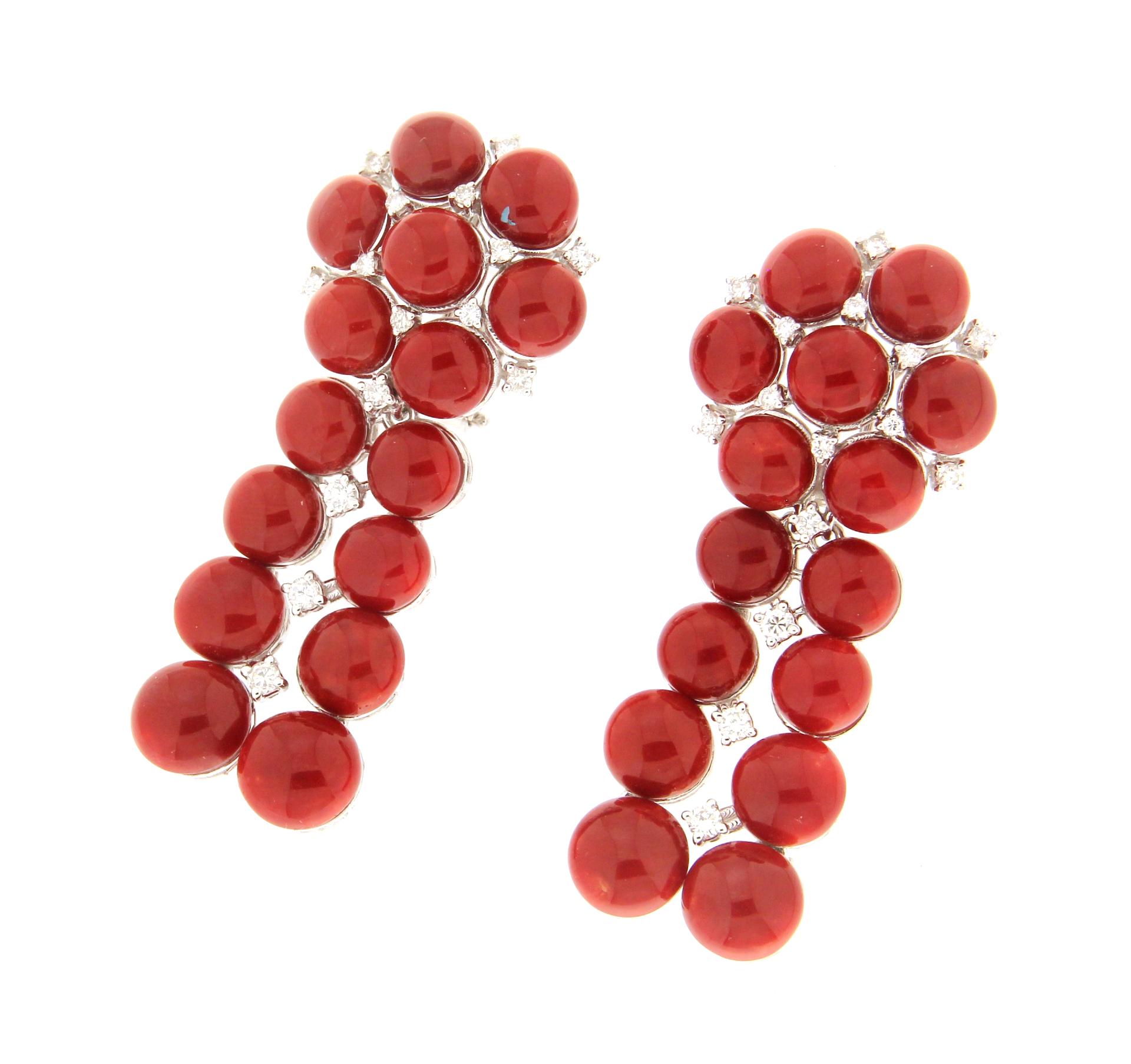 A unique and exclusive piece of jewelry, these 18K white gold drop earrings are the perfect combination of luxury and sophistication. Crafted with high-quality natural Sardinian coral, whose deep red tones evoke the beauty of the Mediterranean,