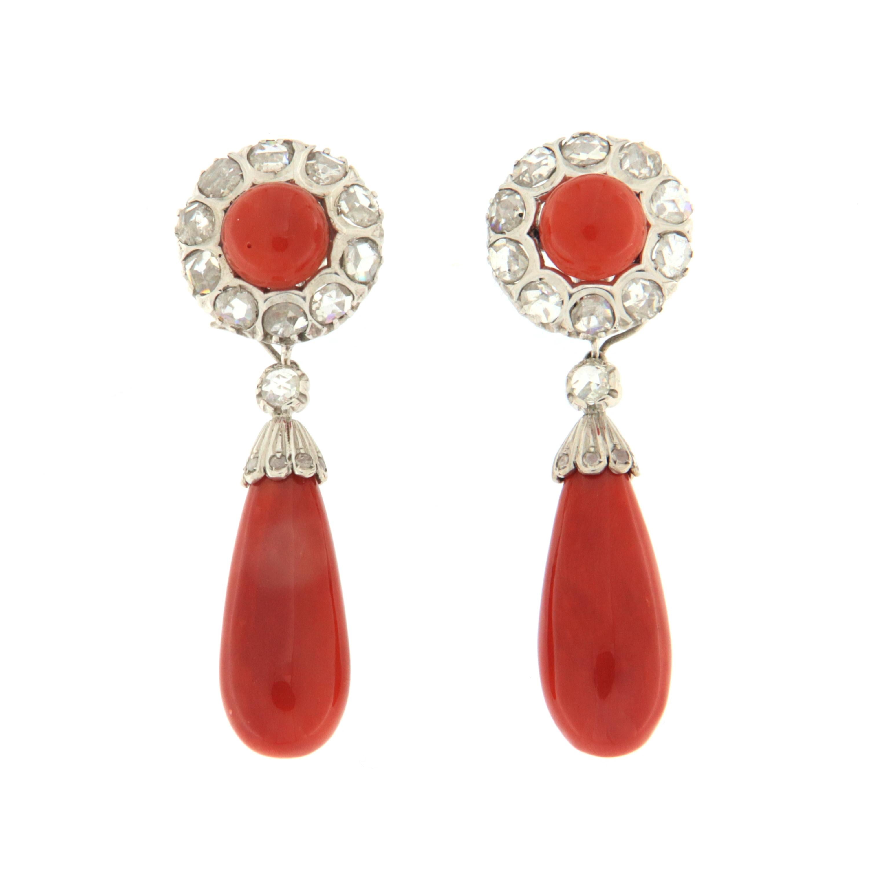 Beautiful earrings 14 karat white gold mounted with Sardinian coral and rose diamonds.
Earrings created by craftsmen.
It's possibile wear the earrings without the lower part
(check photos)

Earrings total weight 16.20 grams
Only Coral weight 6.60