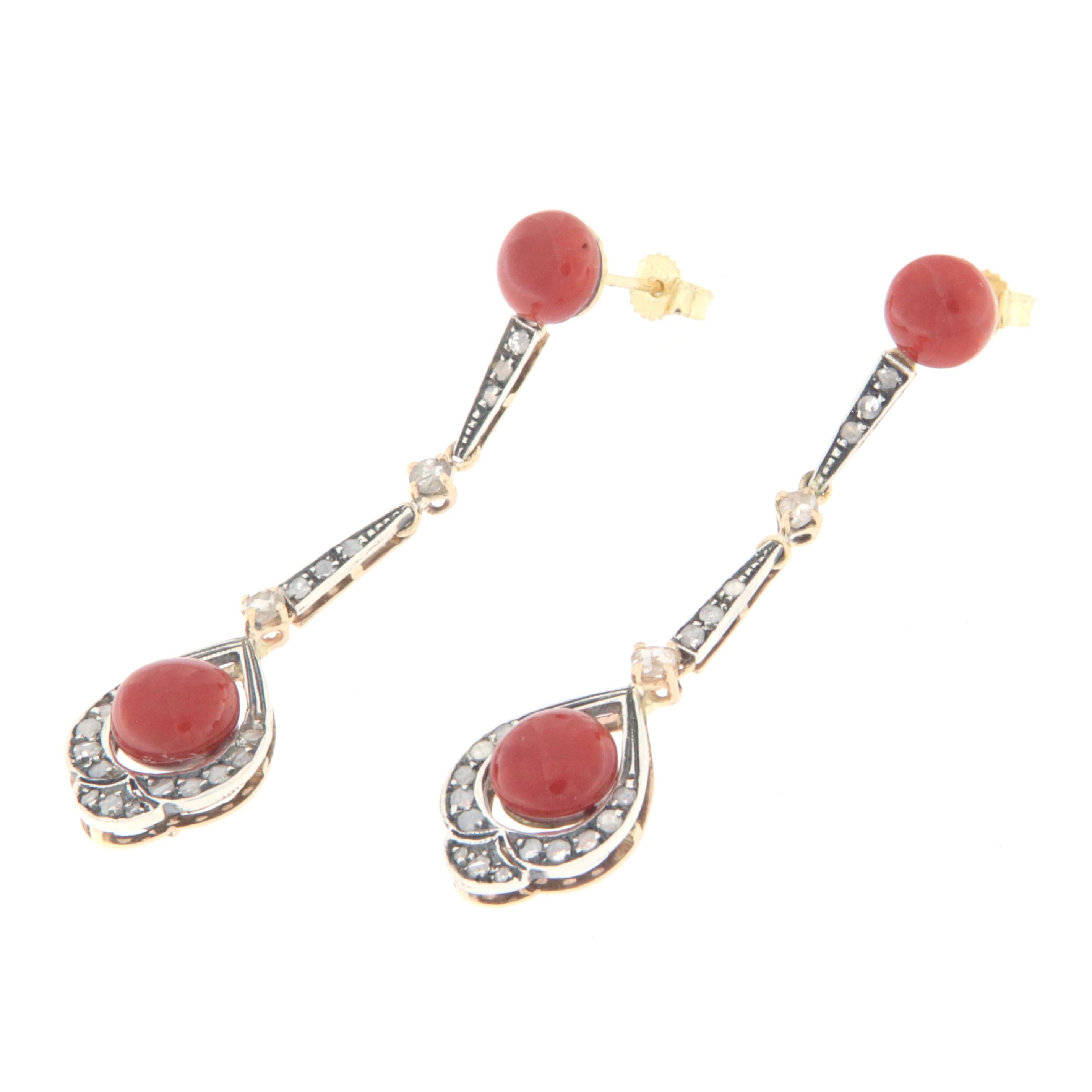 Amazing earrings in 14 karat yellow gold and 800 thousandths silver, 1950s style, Italian manufacture, mounted with old cut diamonds and Sardinian coral

Diamonds weight 0.73 karat
Coral weight 1.70 grams
Earrings total weight 8.50 grams