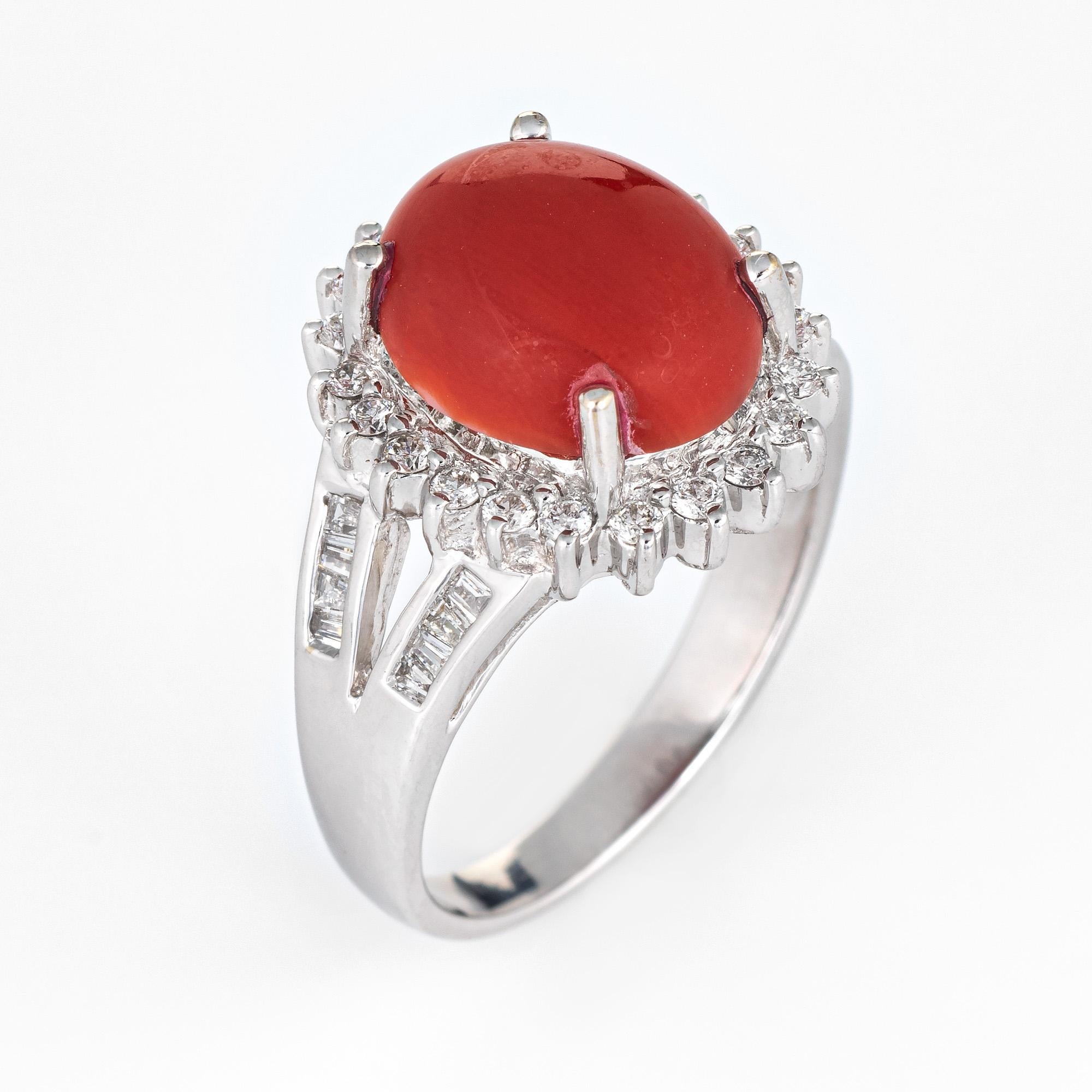 Stylish Sardinian coral & diamond cocktail ring crafted in 18 karat white gold. 

Sardinian red coral cabochon measures 12mm x 10mm (estimated at 5.50 carats). The coral is in very good condition and free of cracks or chips. The diamonds total an