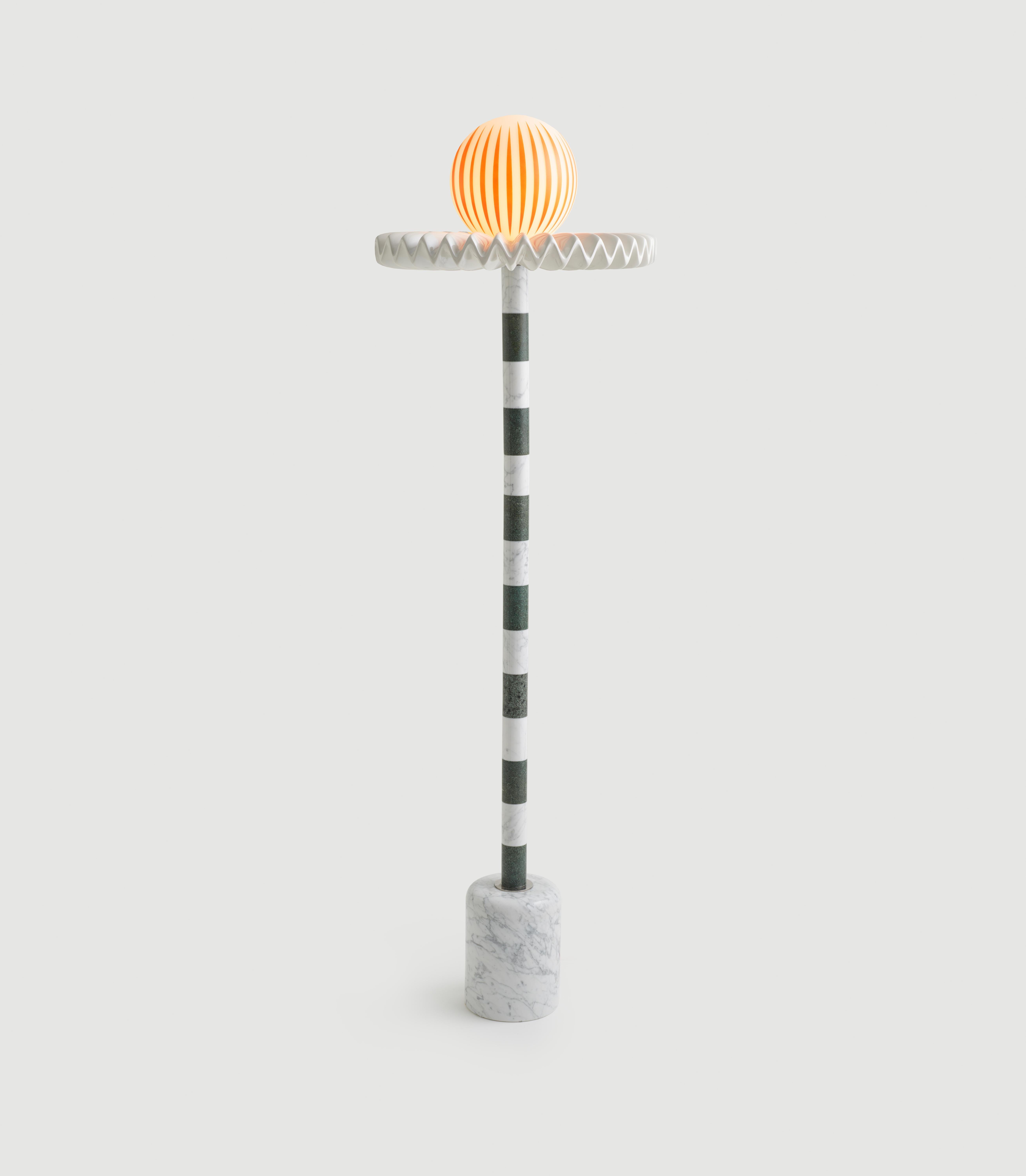Sare Lamp by Merve Kahraman

White and green marble, milk glass and hand painted glass, and polyurethane ruff finished in pearl paint and polished chrome.

21