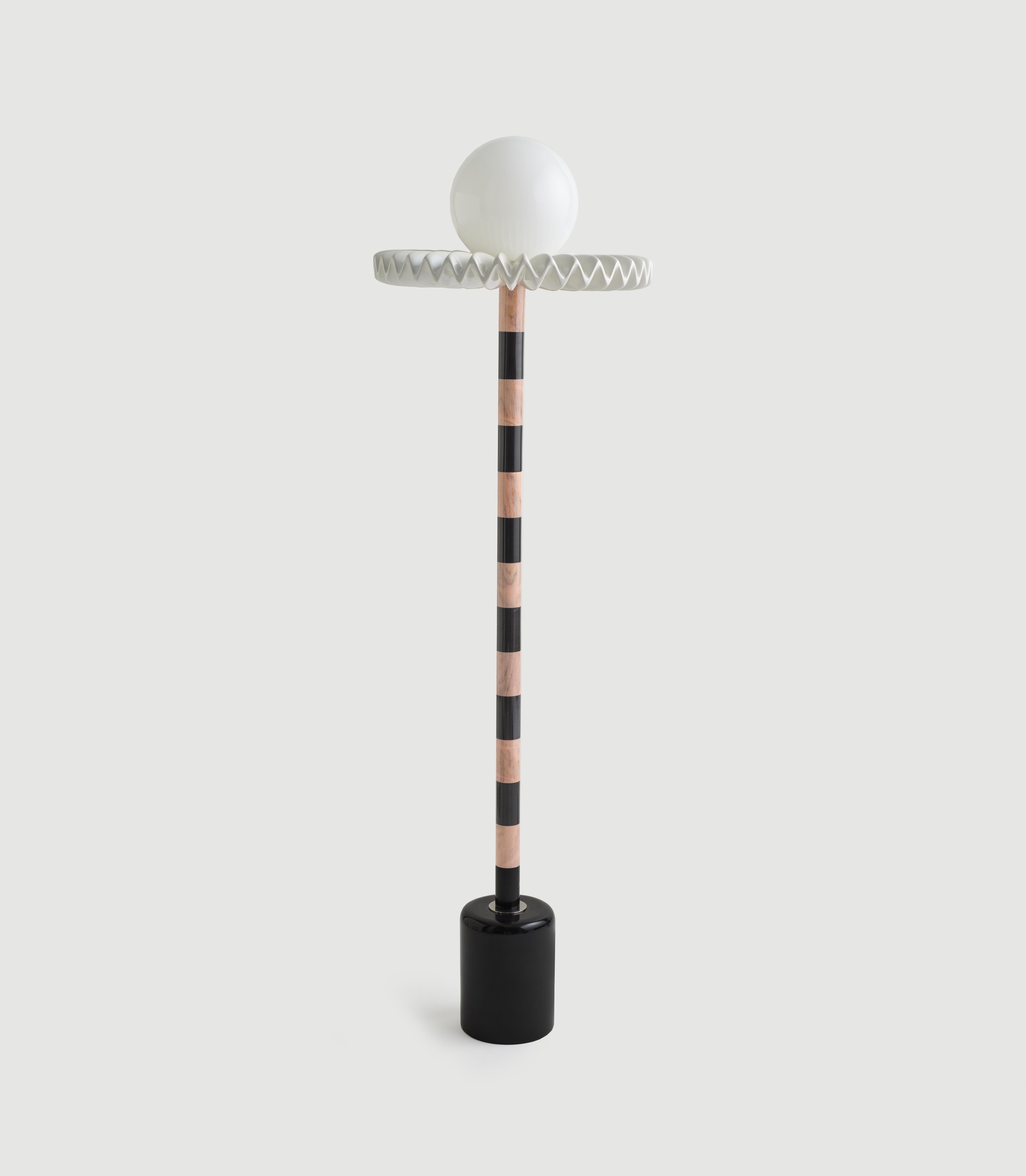 Sare Lamp by Merve Kahraman

White, black, and pink marble, milk glass and hand painted glass, and polyurethane ruff finished in pearl paint and polished chrome.

21