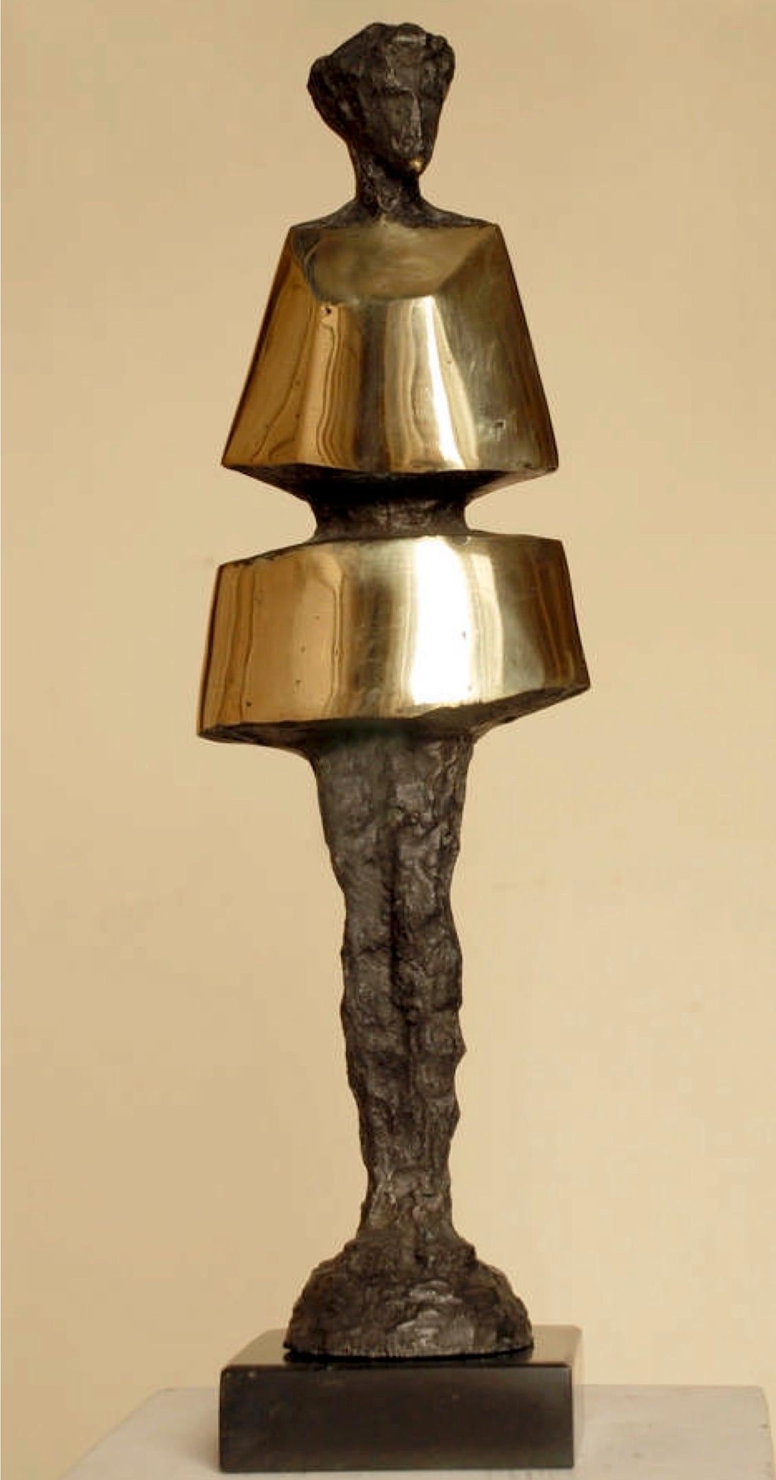 "Fashion Wear" Bronze Sculpture 15" x 5" x 3" inch by Sarkis Tossonian		

Sarkis Tossoonian was born in Alexandria in 1953. He graduated from the Faculty of Fine Arts/Sculpture in 1979. He started exhibiting in individual and group exhibitions in