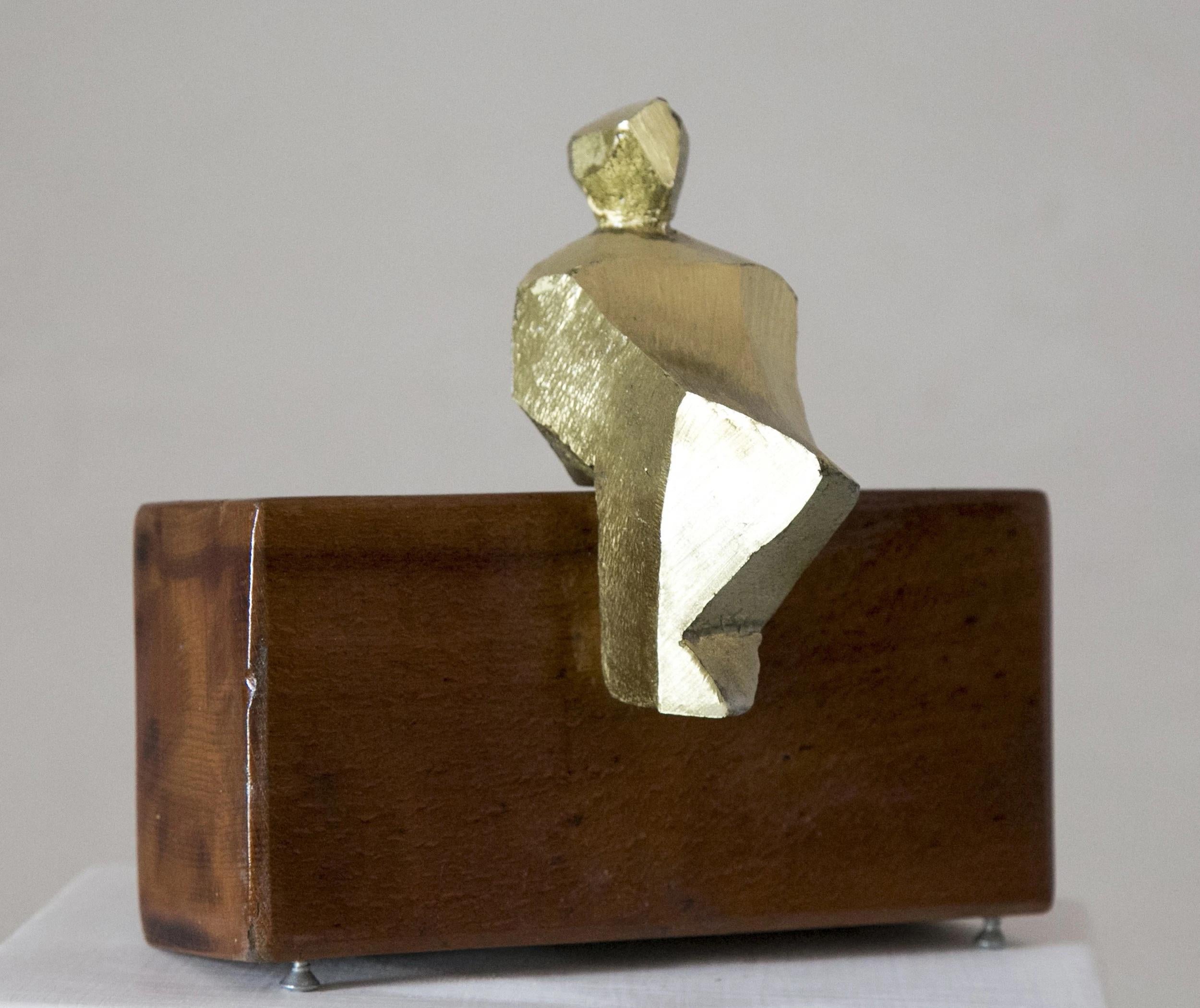 "Minimalist Seated Figure" Sculpture 5" x 2" x 3" inch by Sarkis Tossonian

Sarkis Tossoonian was born in Alexandria in 1953. He graduated from the Faculty of Fine Arts/Sculpture in 1979. He started exhibiting in individual and group exhibitions in