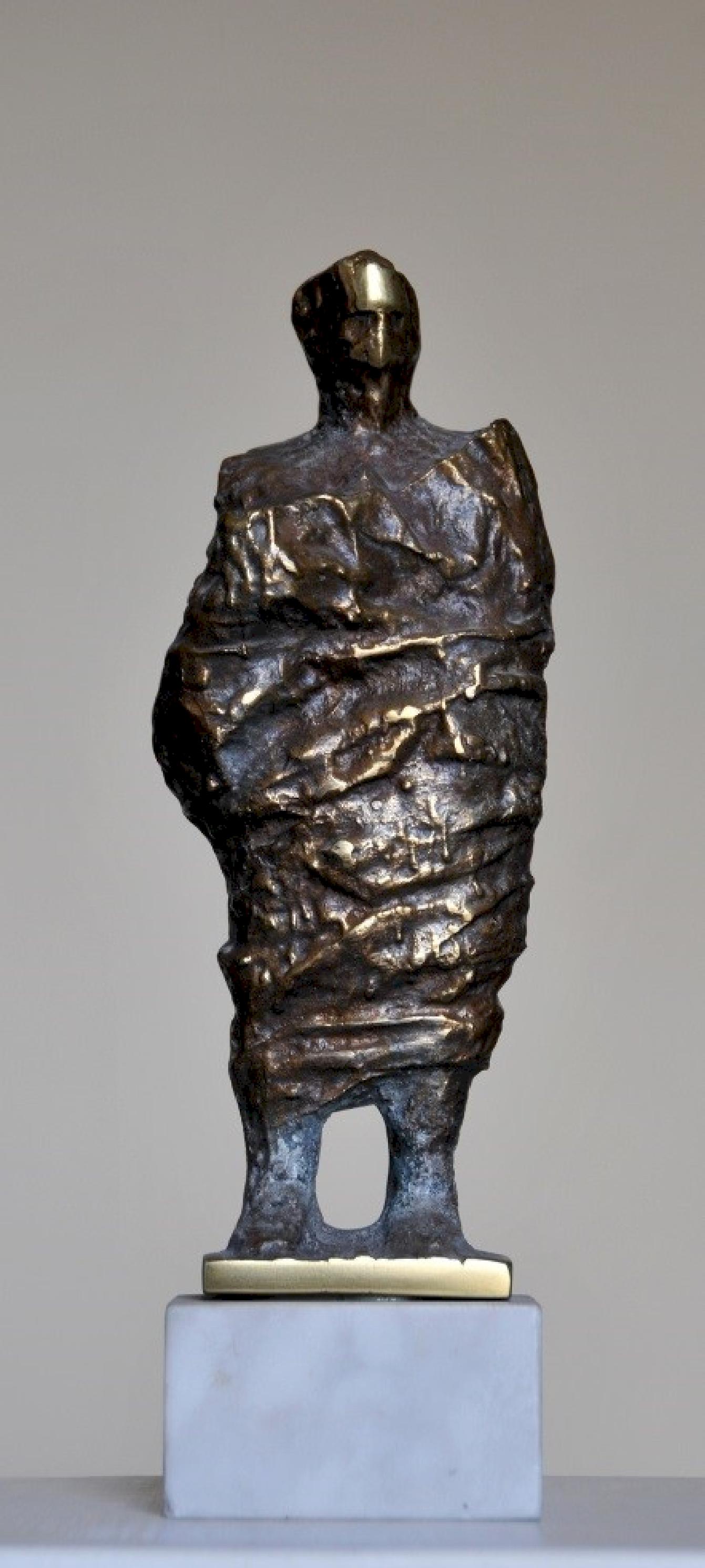 "Robed II" Bronze Sculpture 10" x 4" x 2" inch by Sarkis Tossonian

Sarkis Tossoonian was born in Alexandria in 1953. He graduated from the Faculty of Fine Arts/Sculpture in 1979. He started exhibiting in individual and group exhibitions in
