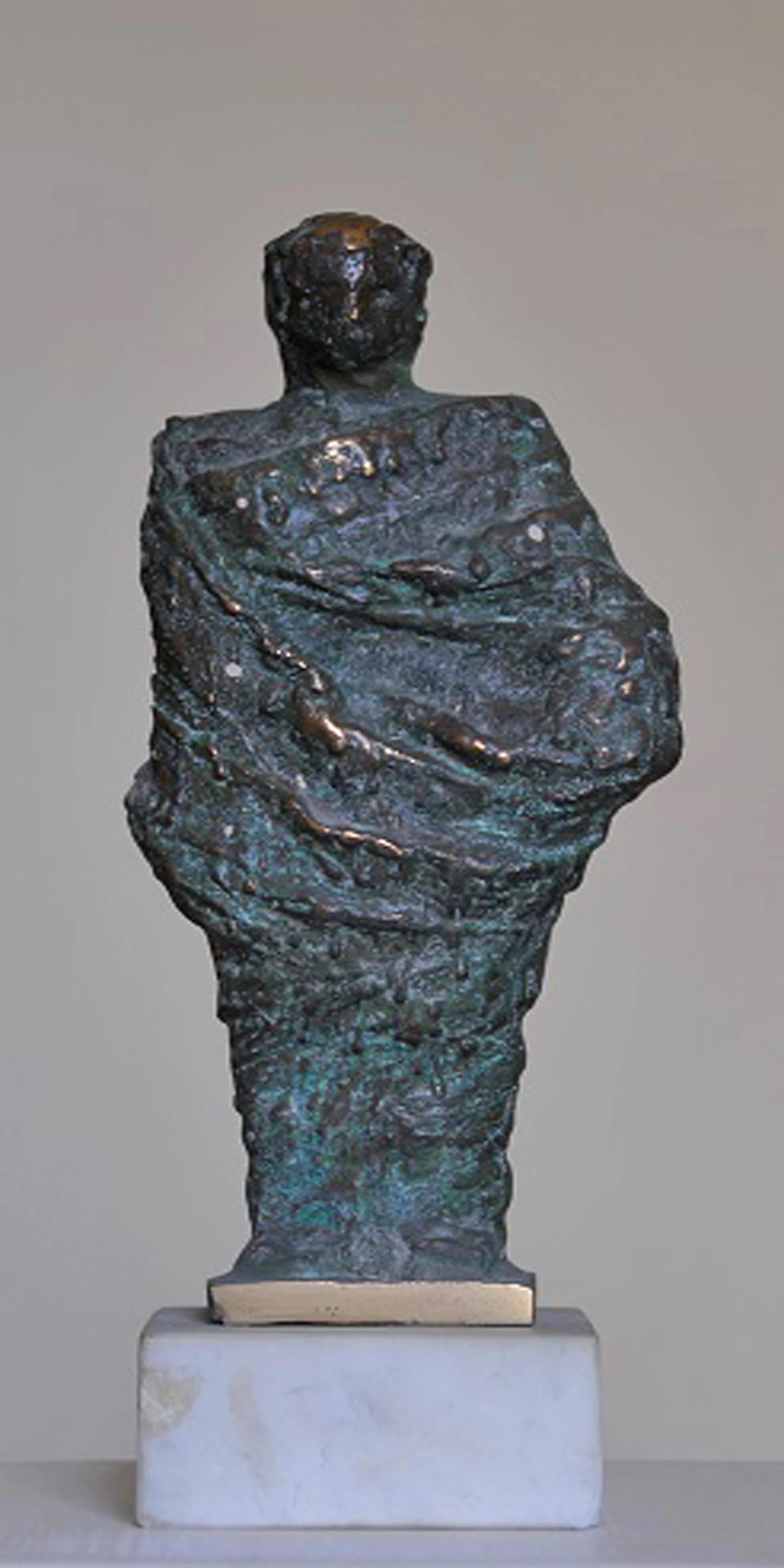 "Robed III" Bronze Sculpture 9.5" x 4" x 3" inch by Sarkis Tossonian

Sarkis Tossoonian was born in Alexandria in 1953. He graduated from the Faculty of Fine Arts/Sculpture in 1979. He started exhibiting in individual and group exhibitions in