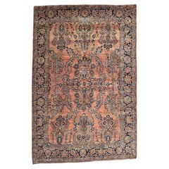 Sarouk with Soft Salmon Field and Taupe, Navy, and Cornflower Blue Tones c.1920