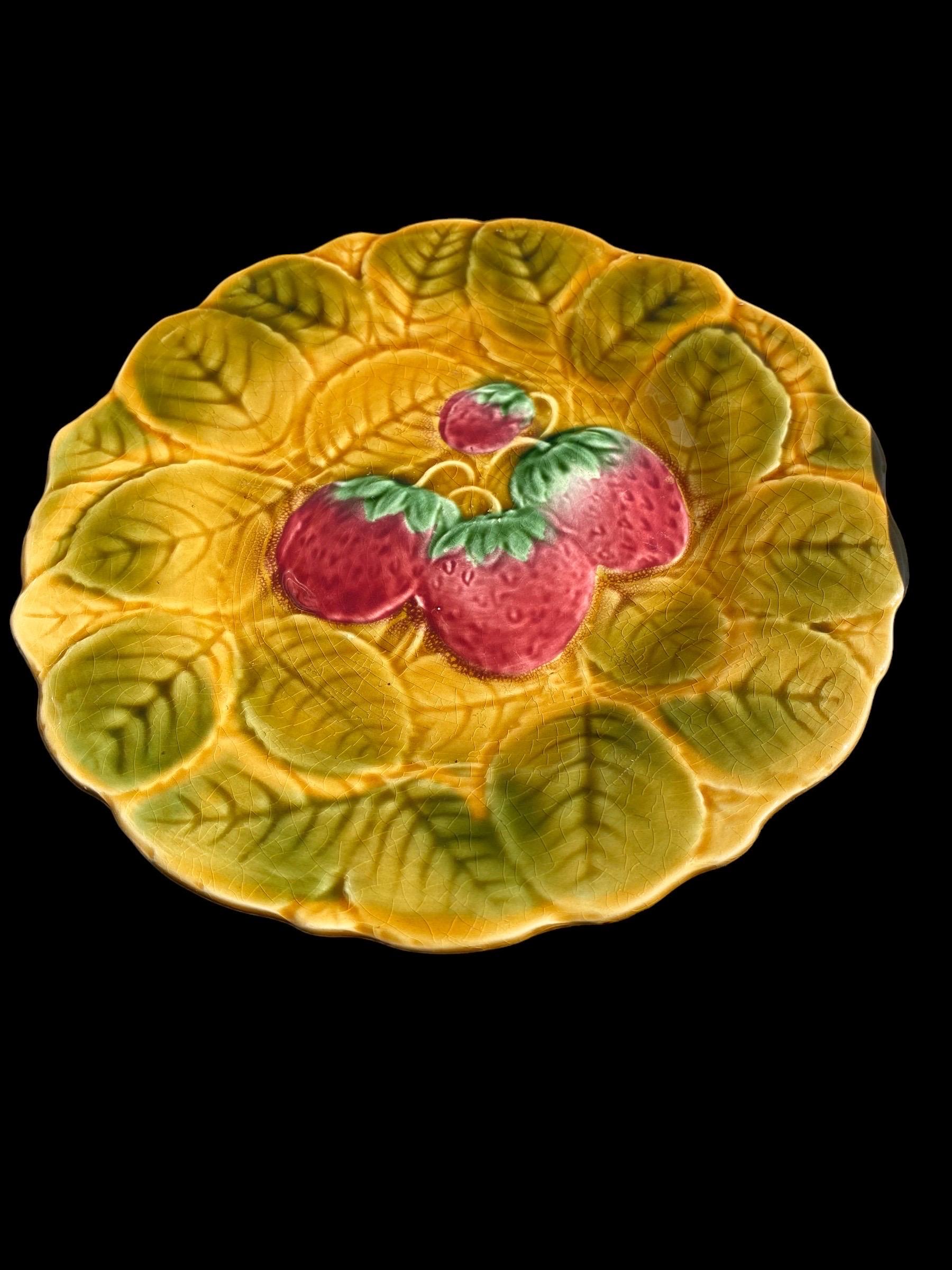 Own a piece of history with these antique French Sarreguemines Barbotine set of eight plates and one platter from the Parisian 1930's.
Each is decorated and embossed, with different colorful fruits upon a lovely gold background.
Like artwork,