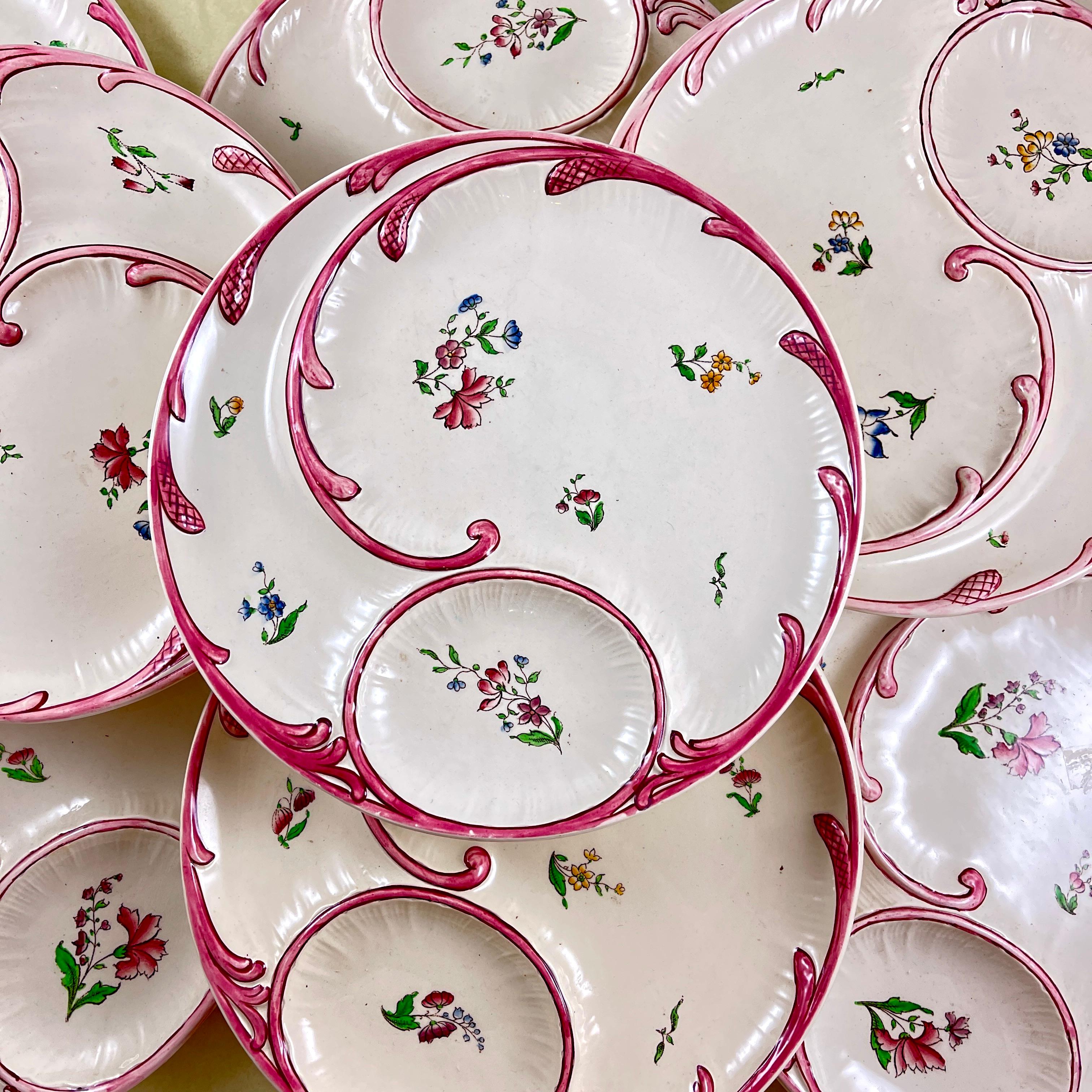 A French faïence hand painted asparagus plate in the Strasbourg pattern from Sarreguemines, circa 1890-1900.

Showing charming naive floral décor, multiple plates are available, each varying slightly in their decoration. The pink asparagus border