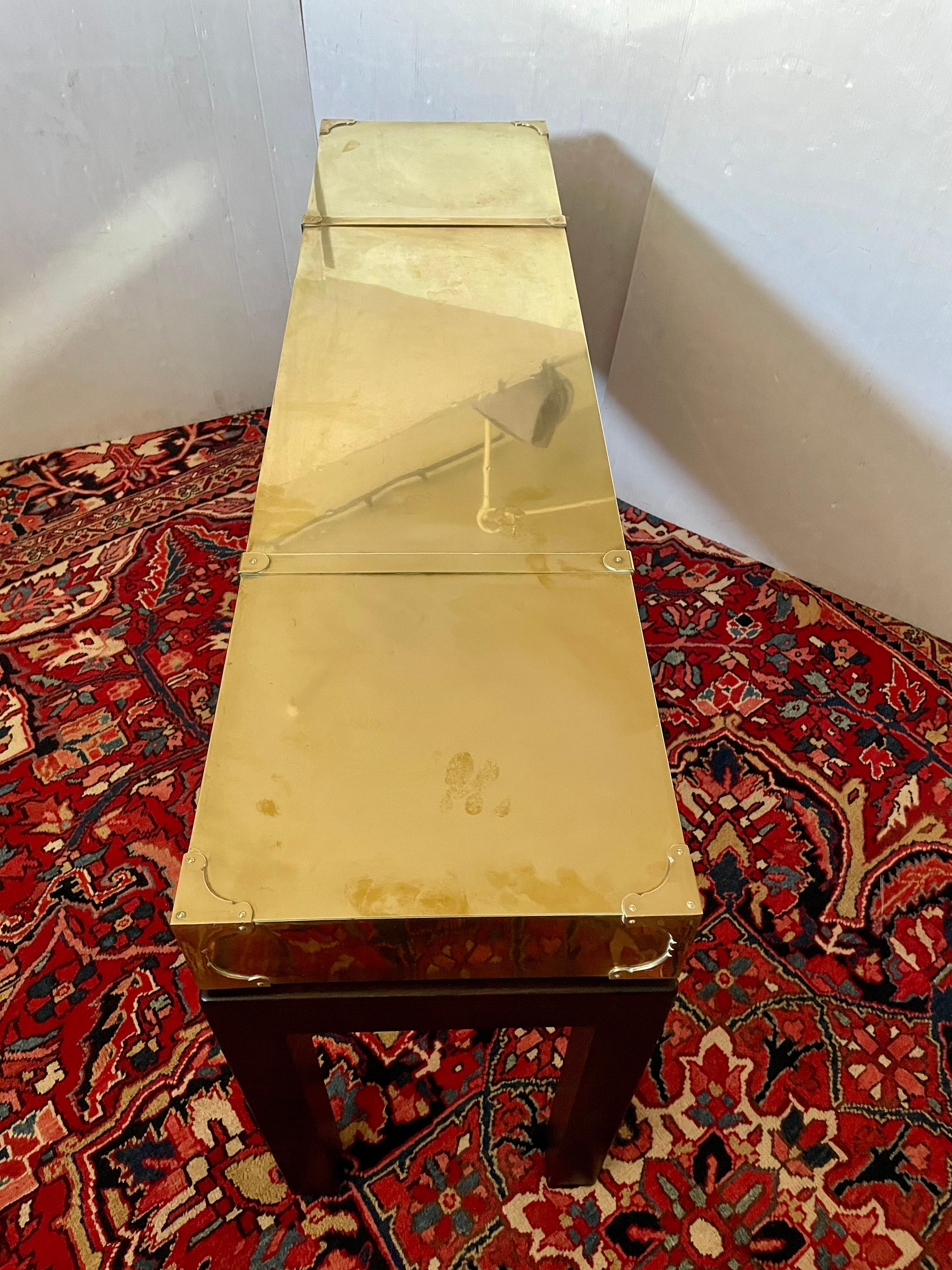 Beautiful and rare console sofa table, manufactured by Sarreid LTD circa 1970s,we have polished the top oiled the base some spots shown and light marks due to age can be professionally polished, but we are selling it AS/Is condition. Its an elegant
