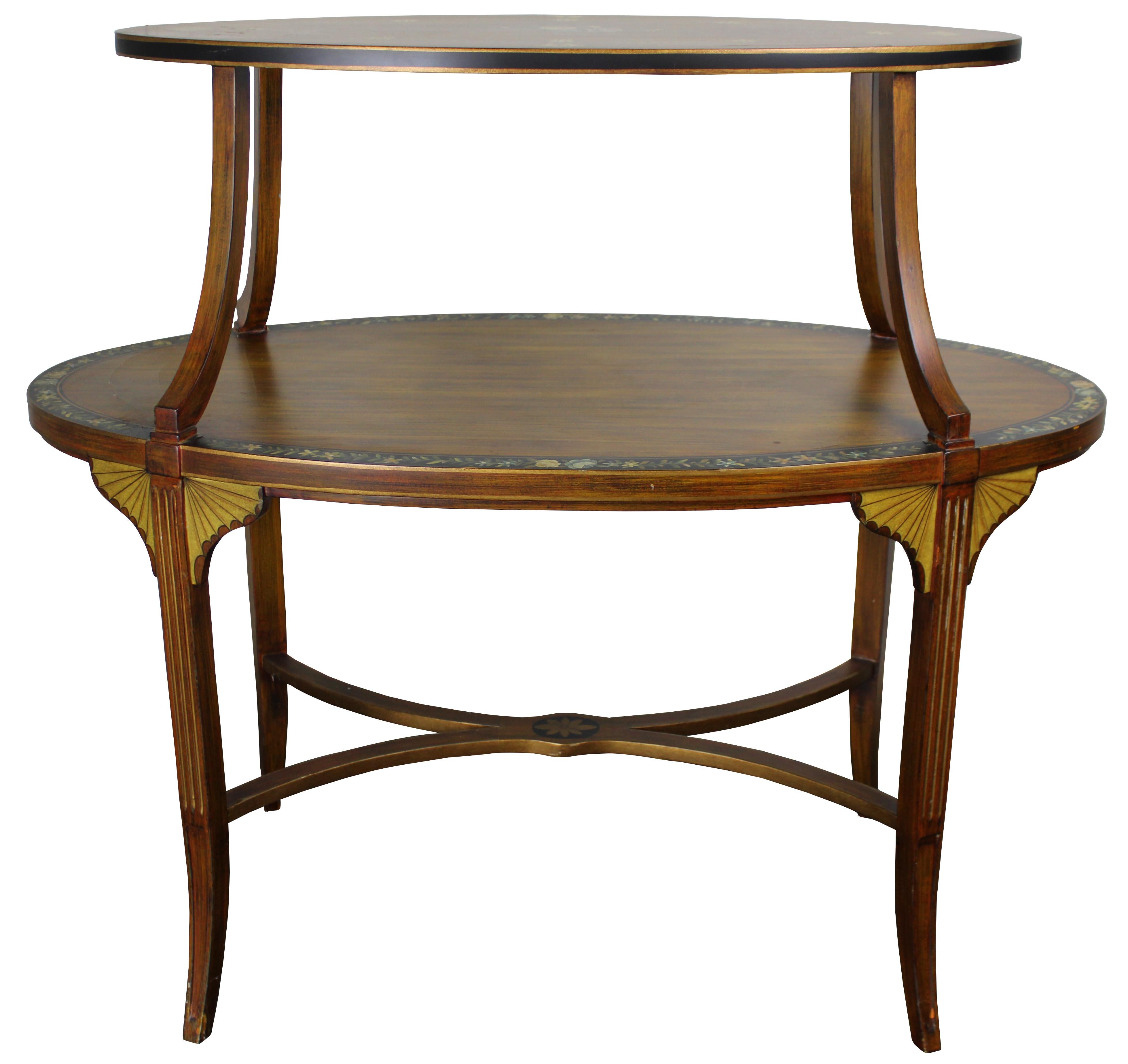 Late 20th century Edwardian inspired tray top étagère by Sarreid Ltd. Features oval surfaces with a painted grain, black trim and floral painted detail. Incudes a neoclassical inspired X-stretcher, fluted legs and winged trim in the style of