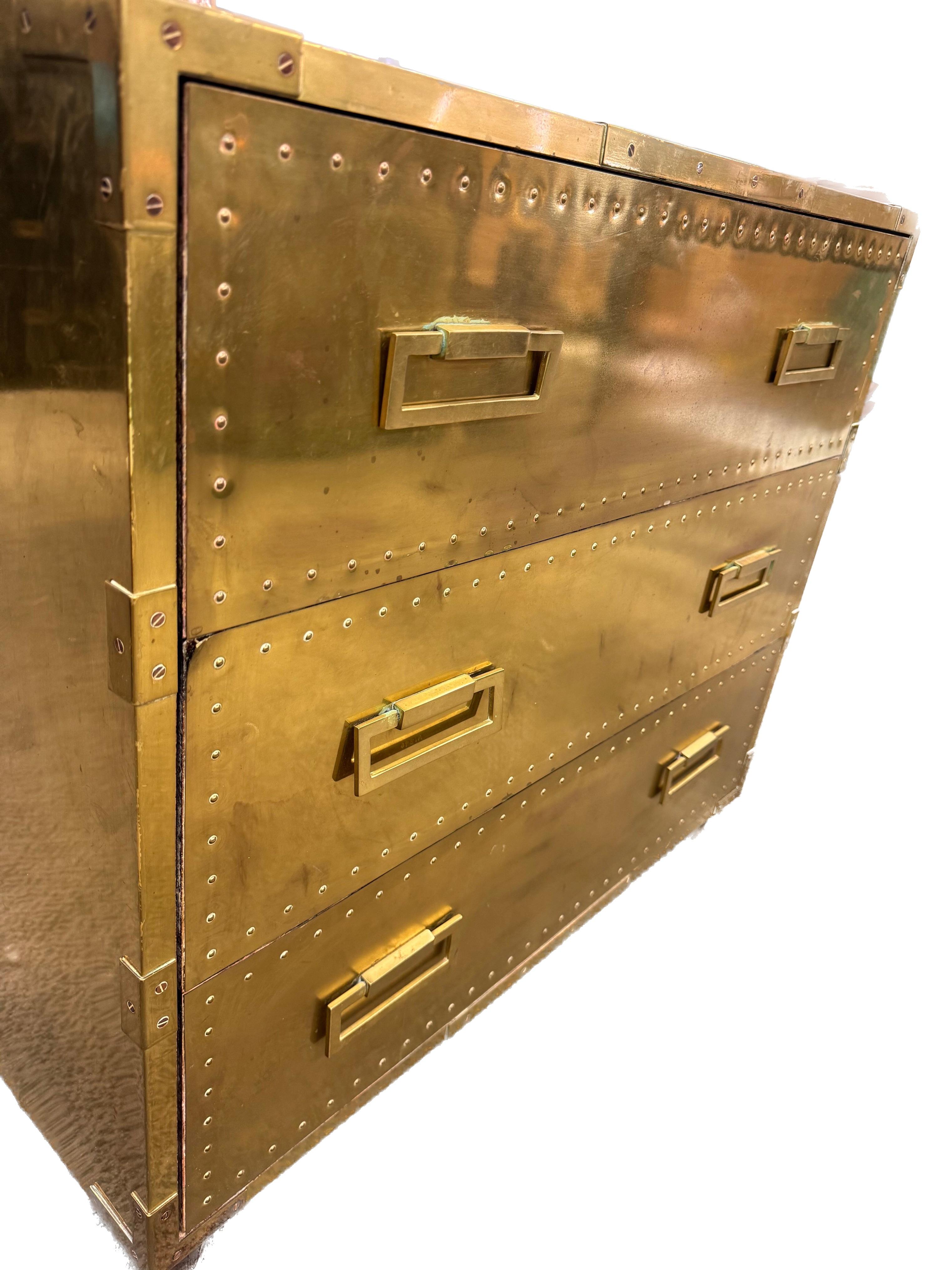 Sarreid Hollywood Regency Campaign Brass Clad Chest of Drawers In Fair Condition For Sale In Chicago, US