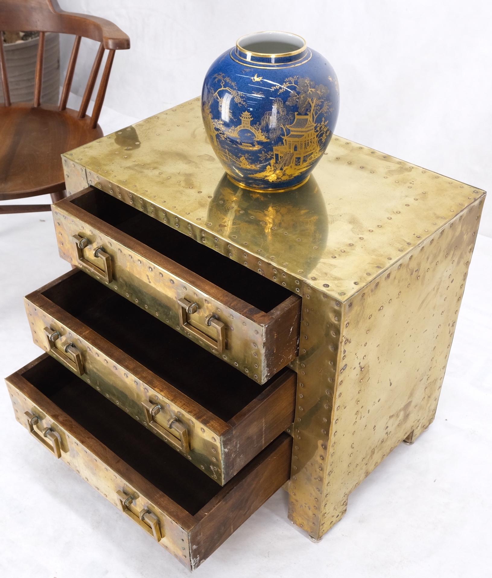 Sarreid Hollywood Regency campaign brass clad compact chest of 3 drawers stand large nightstand end table.