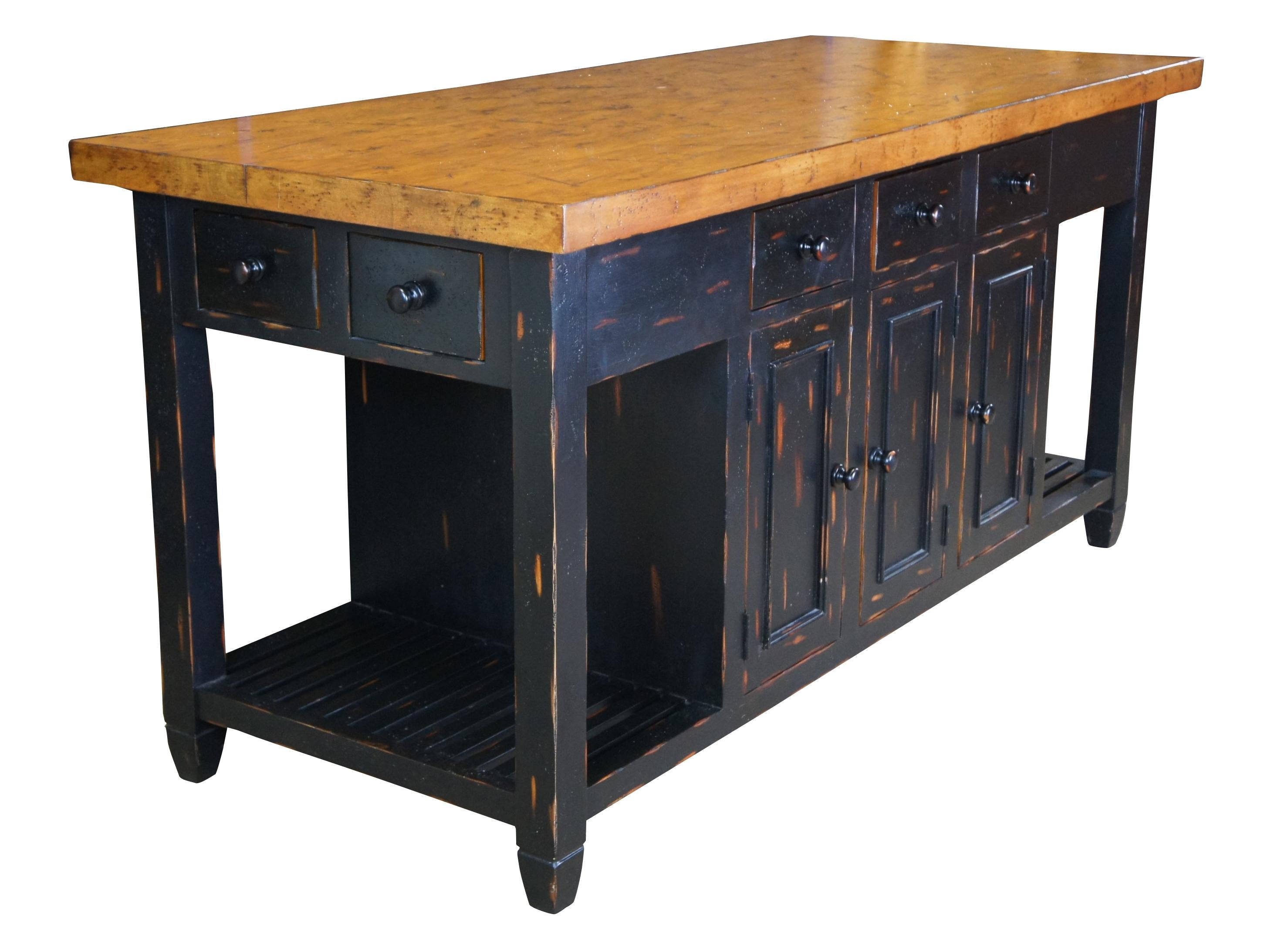 Vintage Sarreid Ltd Farmhouse island / table.  Drawing inspiration from French Country and Farmhouse styling.  Made from pine with natural distressing throughout.  The base or cabinet portion of the table has a dark finish allowing the natural wood