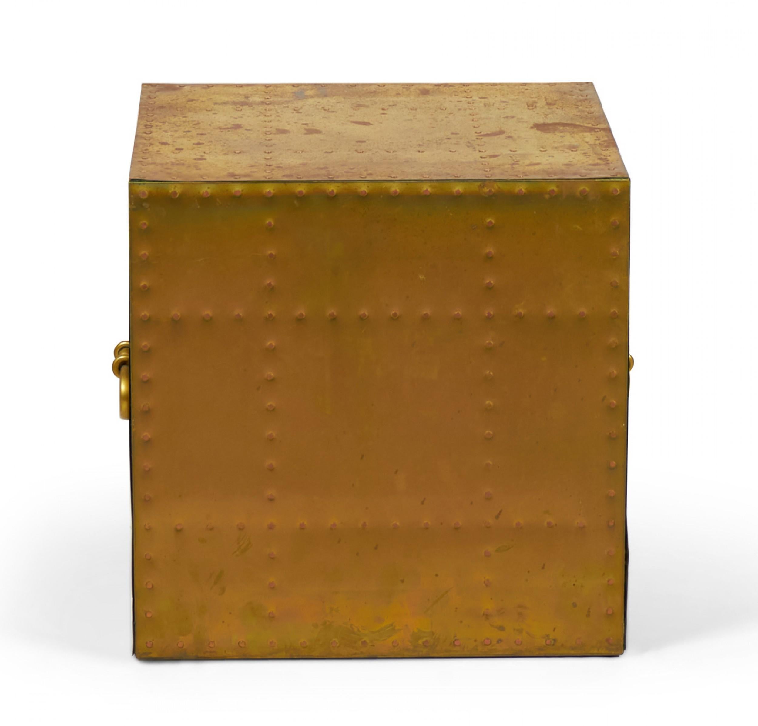 Spanish High Style brass cube occasional table with natural patina, copper studs, and two rounded brass handles. (SARREID, LTD)(Similar pieces available with different patinas: DUF0026A-E, similar commodes: DUF0025A-D)