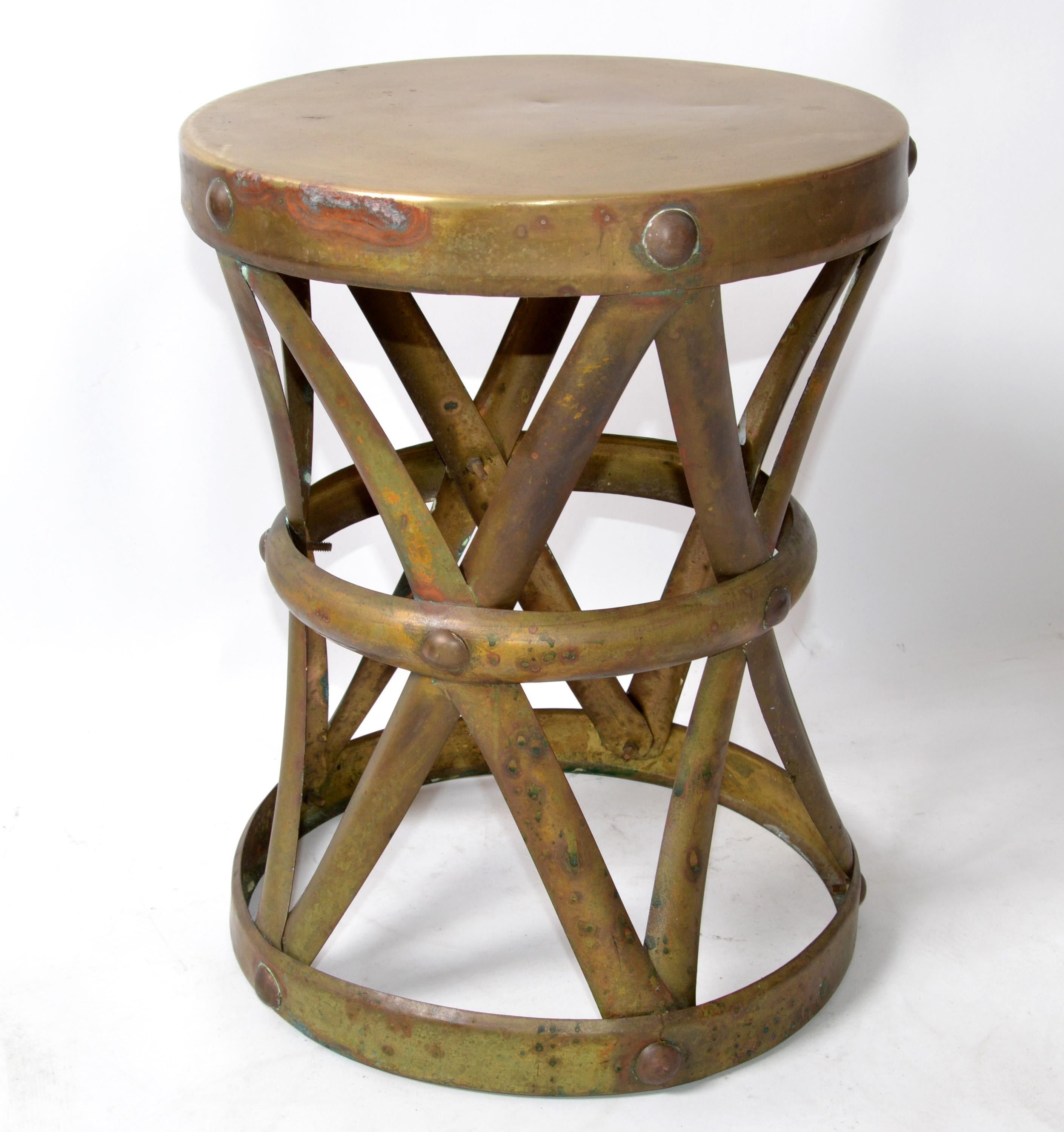 Sarreid Ltd. Spain handcrafted Mid-Century Modern occasional brass drum table or stool.
Left in the warm aged Patina condition to show it's age and History.
Can Be polished for an additional charge and will take circa 3 weeks lead-time.