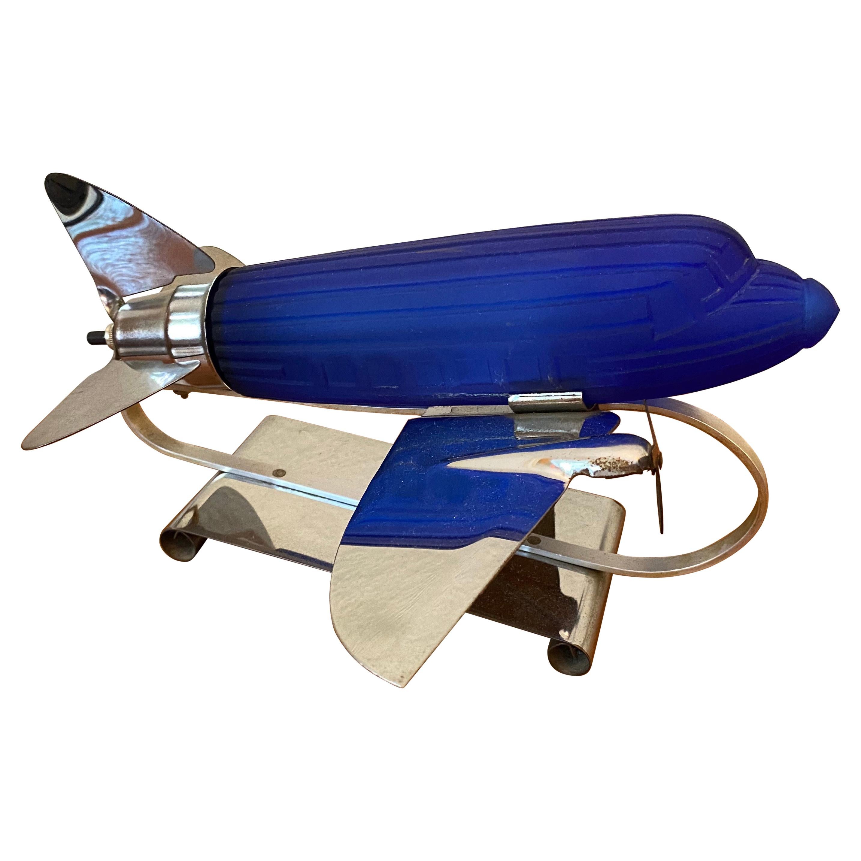 Sarsaparilla Chrome and Blue Glass Airplane Lamp at 1stDibs