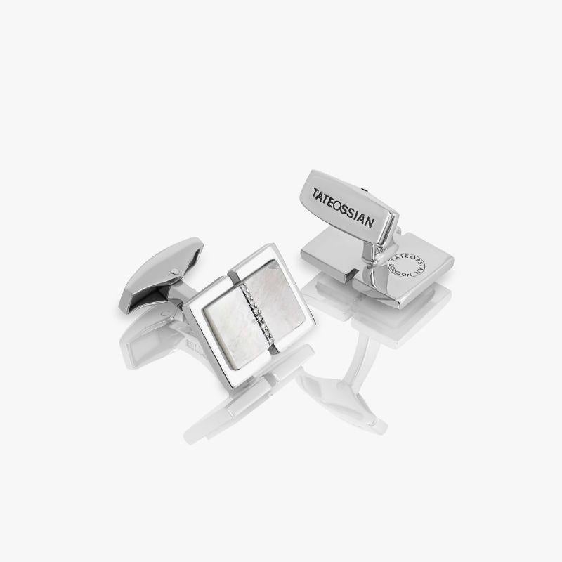 Sartorial Cufflinks in Sterling Silver with Diamonds

These cufflinks feature a white mother of pearl centre combined with 18K white gold for a contemporary style. The minimalistic rectangular shape is joined through the middle by a row of diamonds